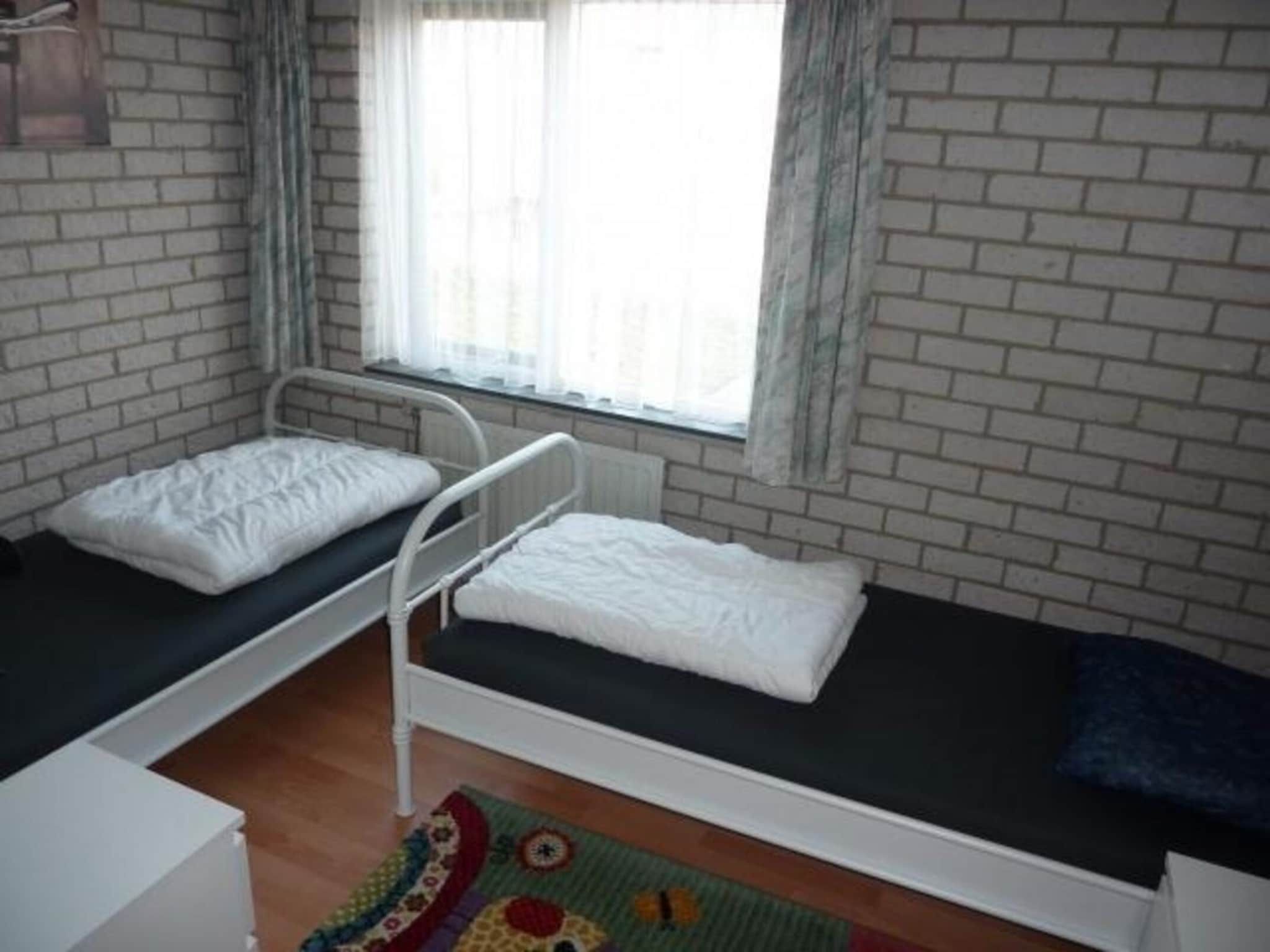 Een slaapkamer van Schoneveld 369 Strandparel Breskens in Breskens