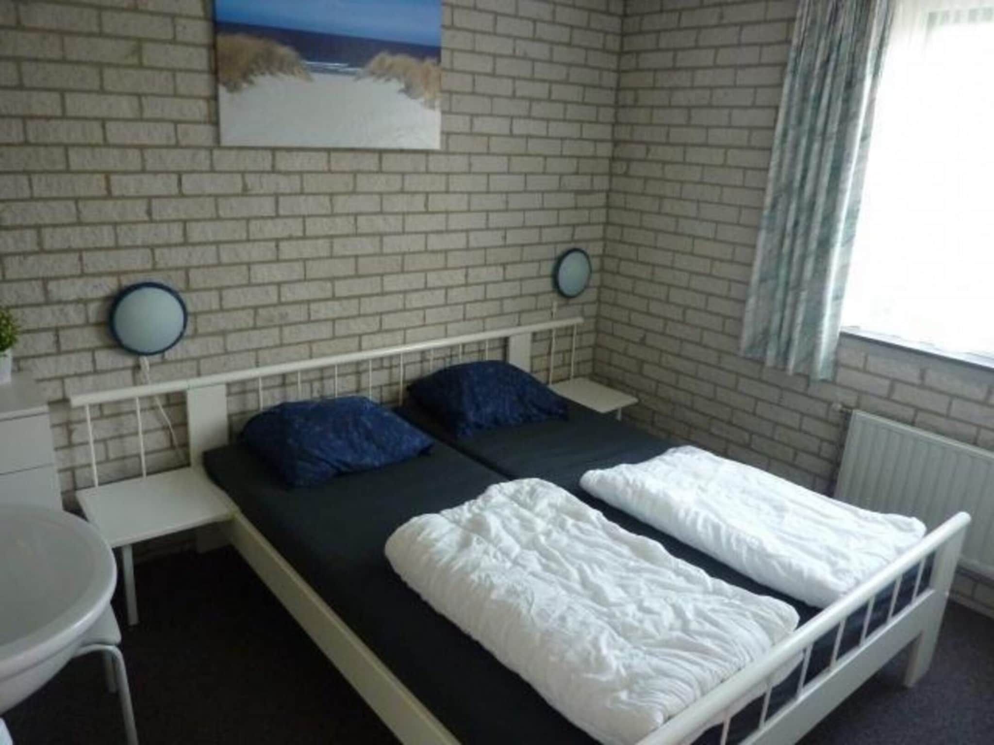 Een slaapkamer van Schoneveld 369 Strandparel Breskens in Breskens