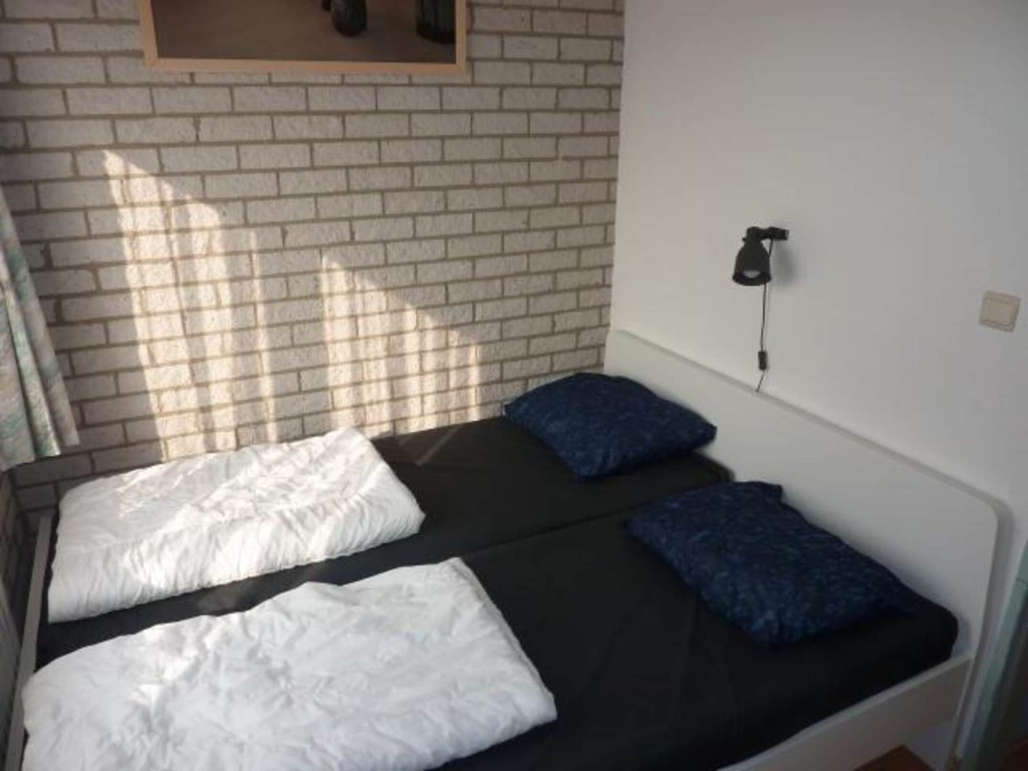 Een slaapkamer van Schoneveld 369 Strandparel Breskens in Breskens