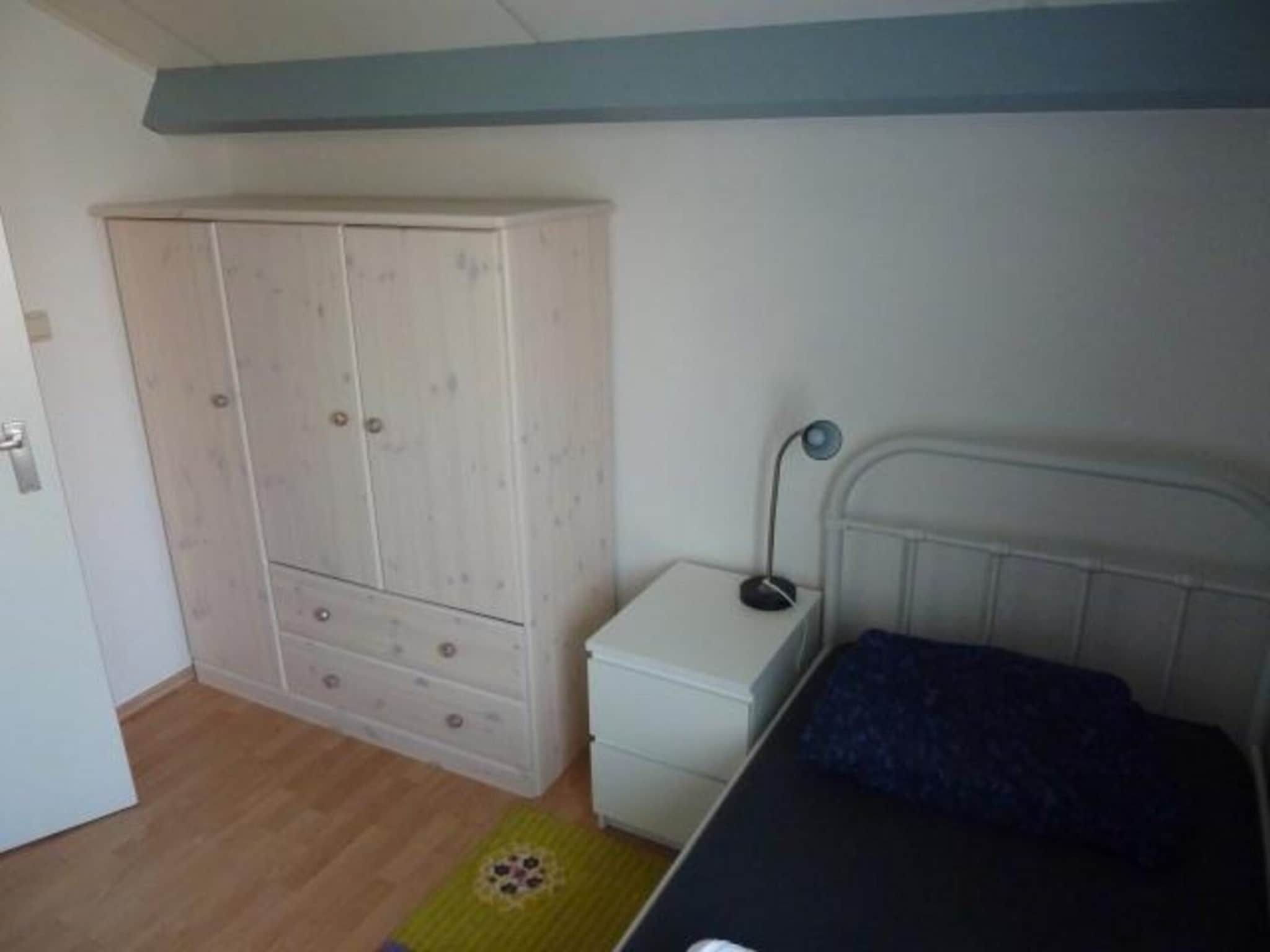 Een slaapkamer van Schoneveld 369 Strandparel Breskens in Breskens