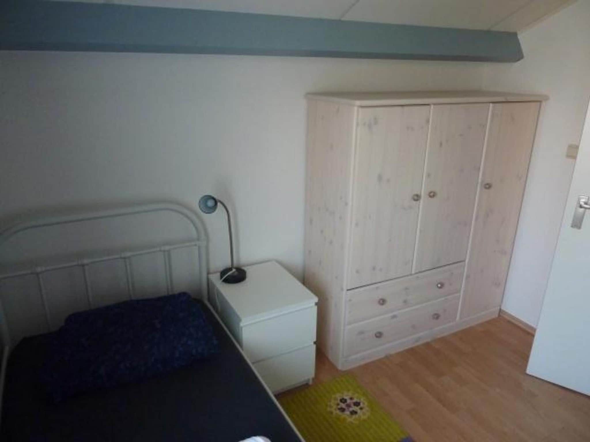 Een slaapkamer van Schoneveld 369 Strandparel Breskens in Breskens