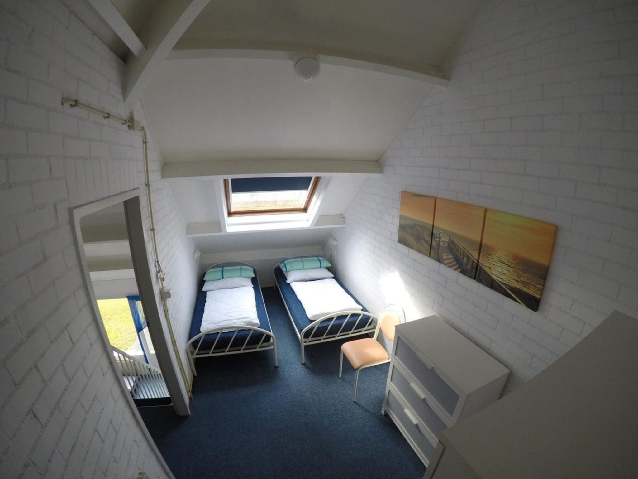 Een slaapkamer van Schoneveld 137 Duinroos Breskens in Breskens