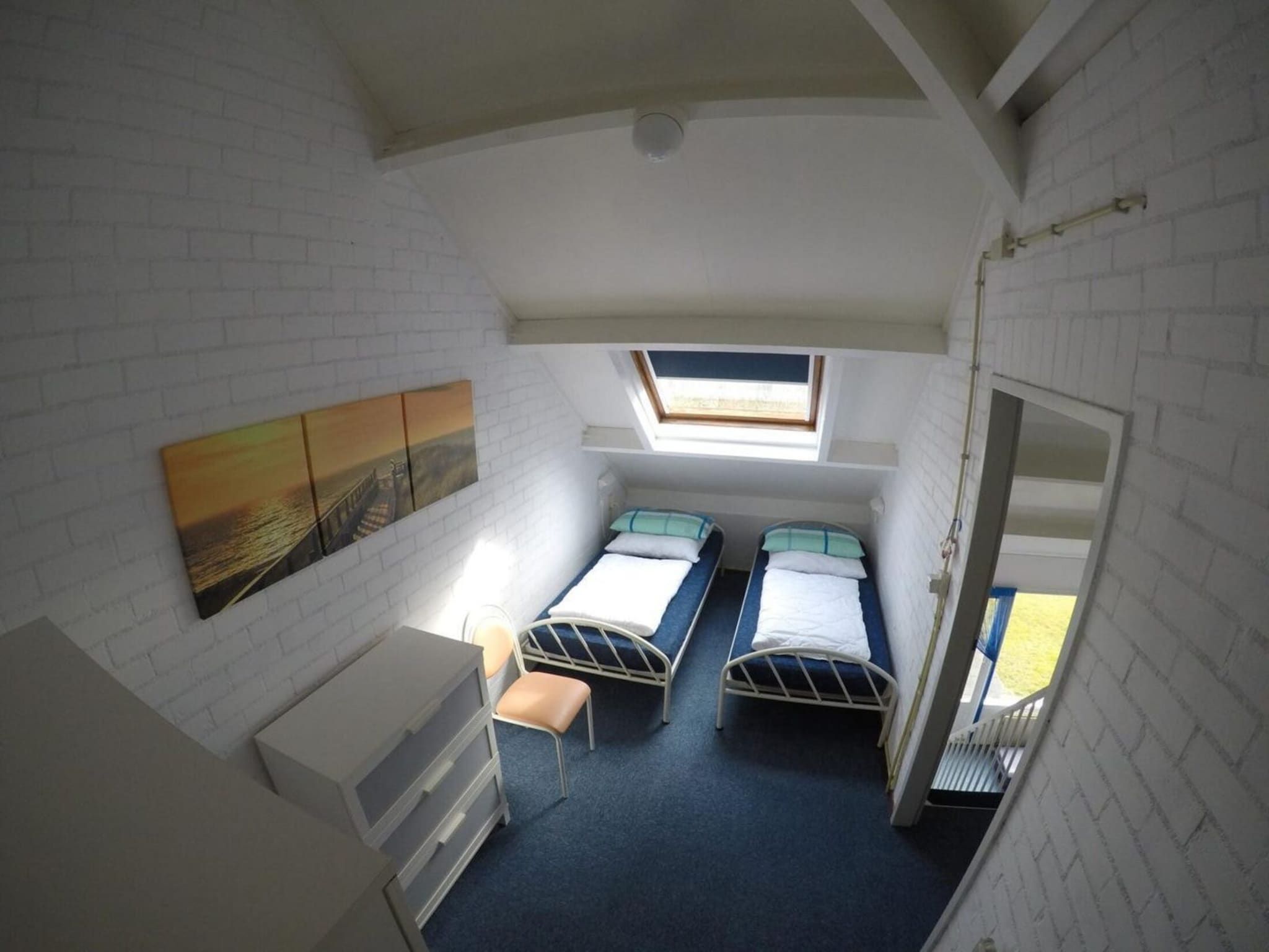 Een slaapkamer van Schoneveld 137 Duinroos Breskens in Breskens