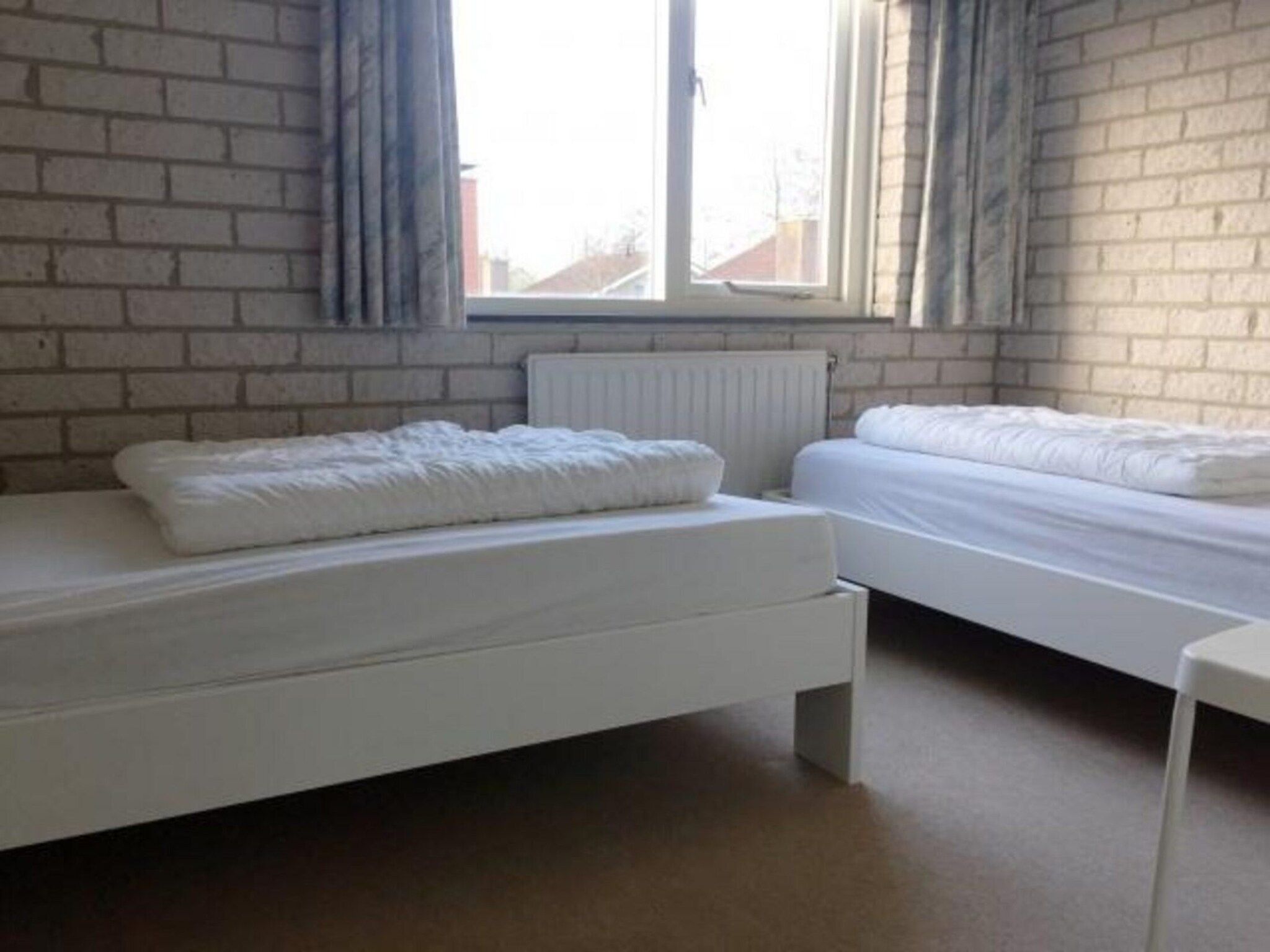 Een slaapkamer van Schoneveld 371 Strandparel Breskens in Breskens