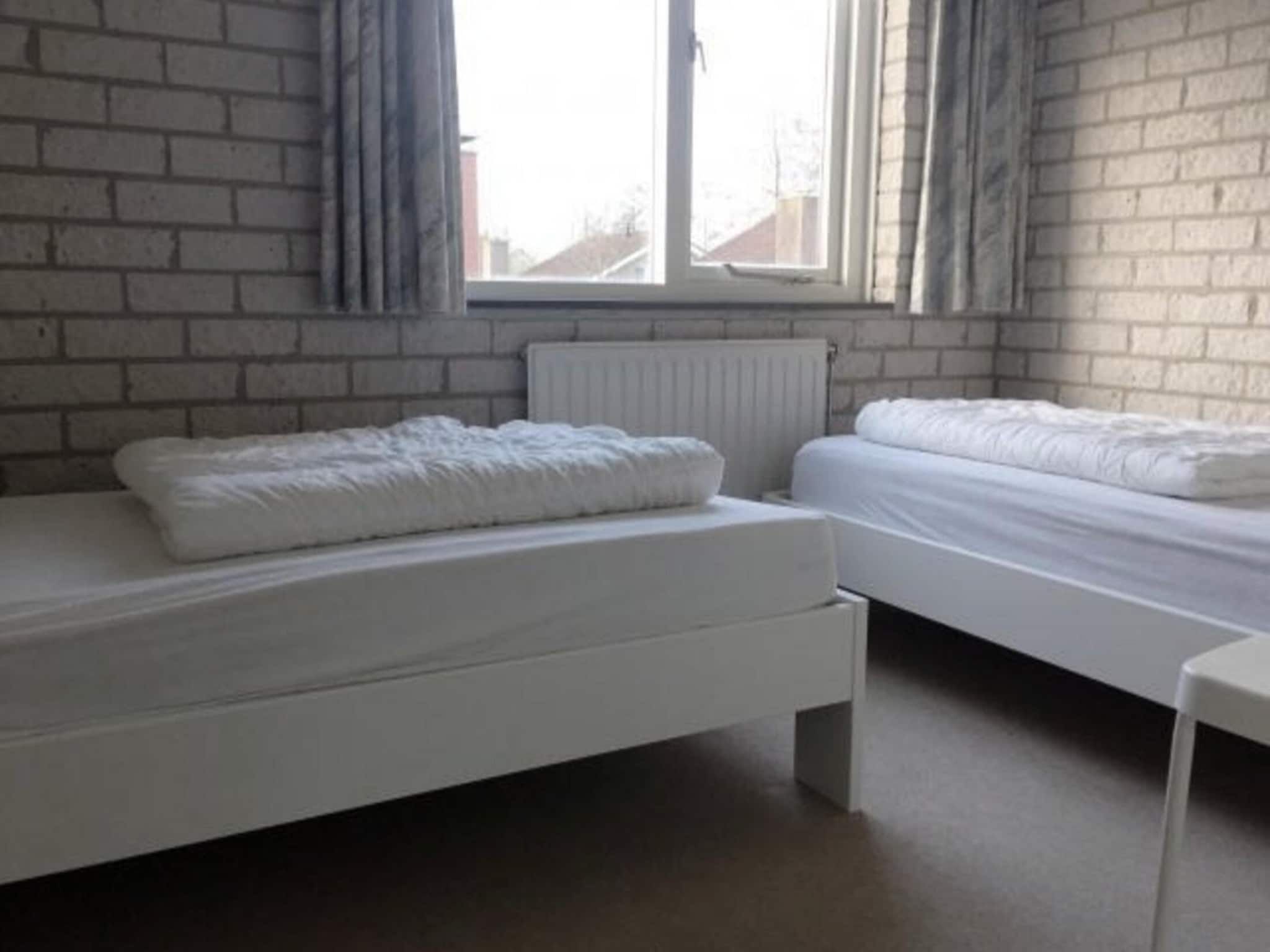Een slaapkamer van Schoneveld 371 Strandparel Breskens in Breskens