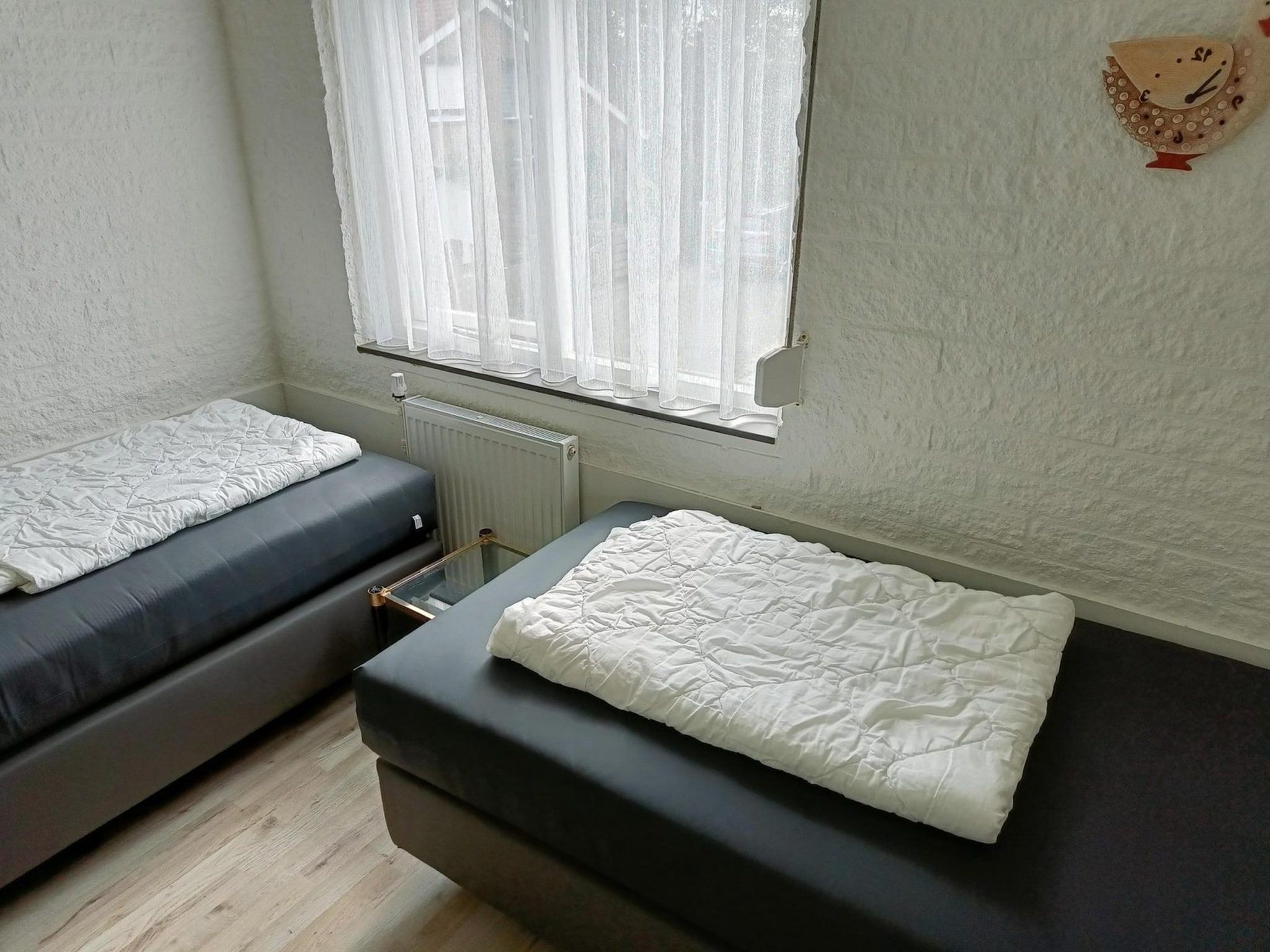 Een slaapkamer van Schoneveld 373 Strandparel Breskens in Breskens