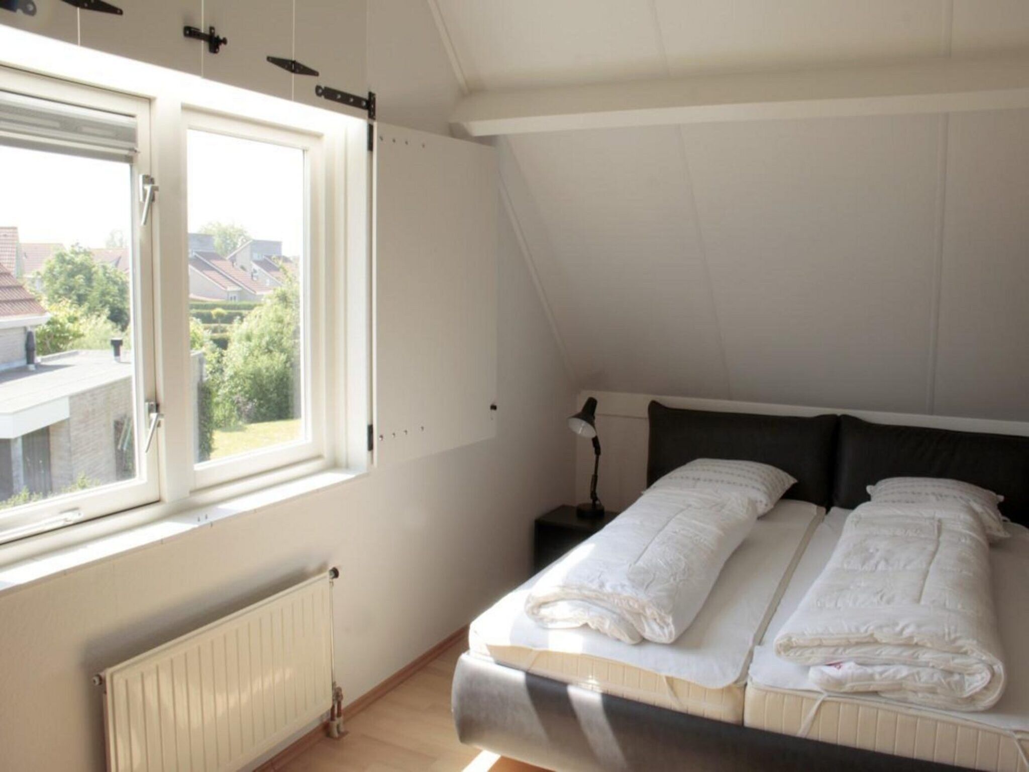 Een slaapkamer van Scheldeveste 14 Zwin Breskens in Breskens