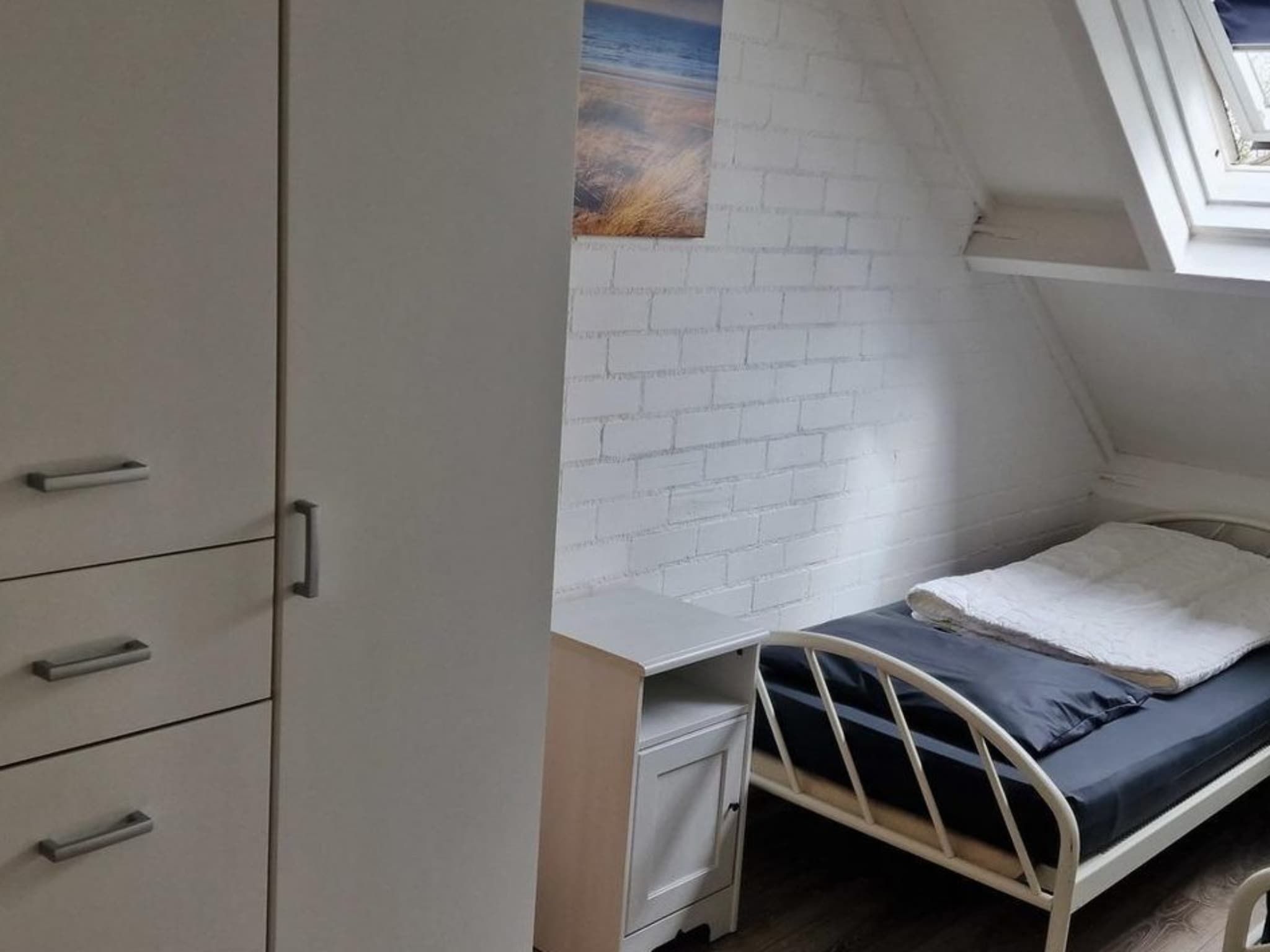 Een slaapkamer van Schoneveld 157 Duinroos Breskens in Breskens