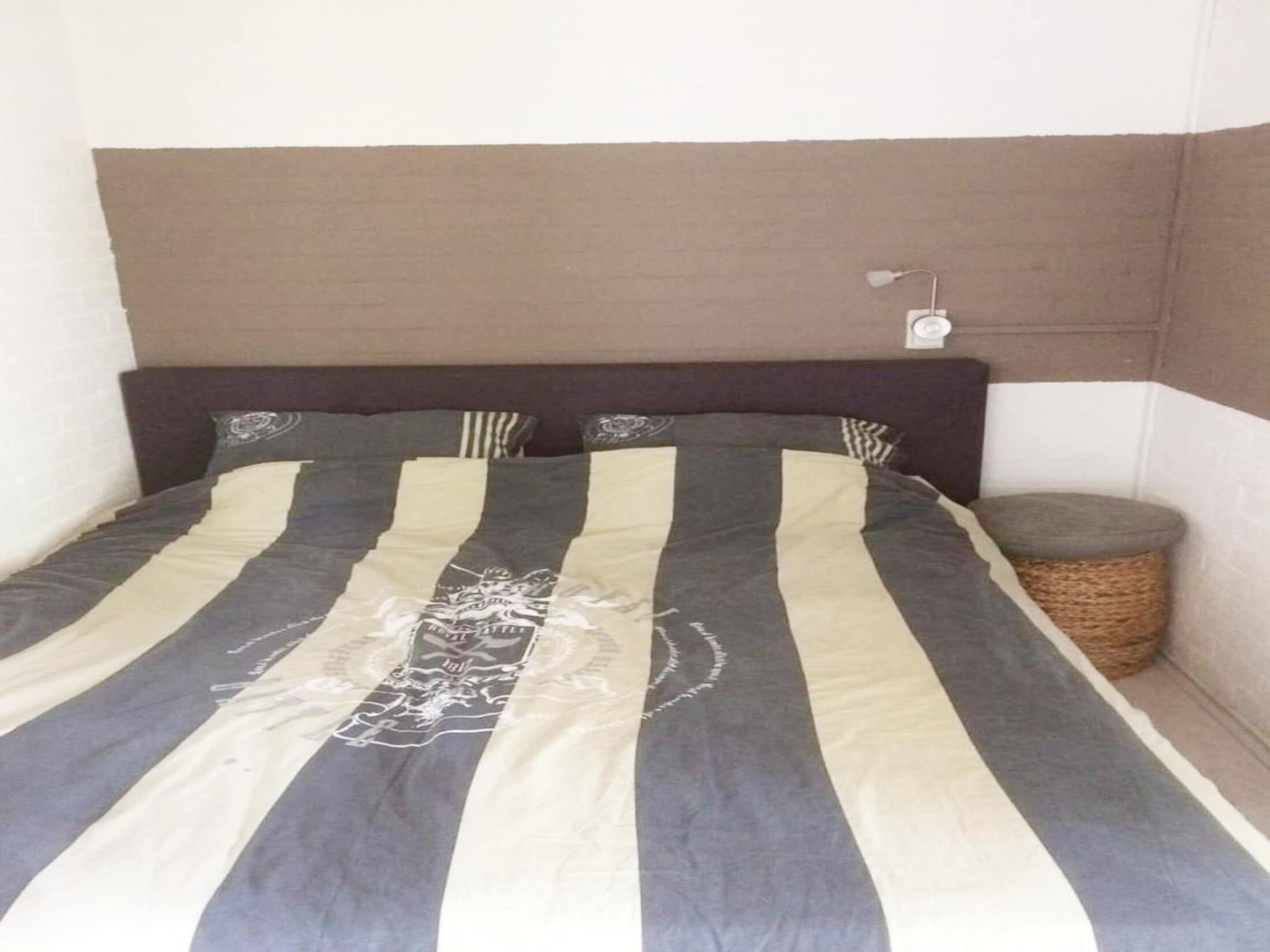 Een slaapkamer van Schoneveld 163 Duinroos Breskens in Breskens