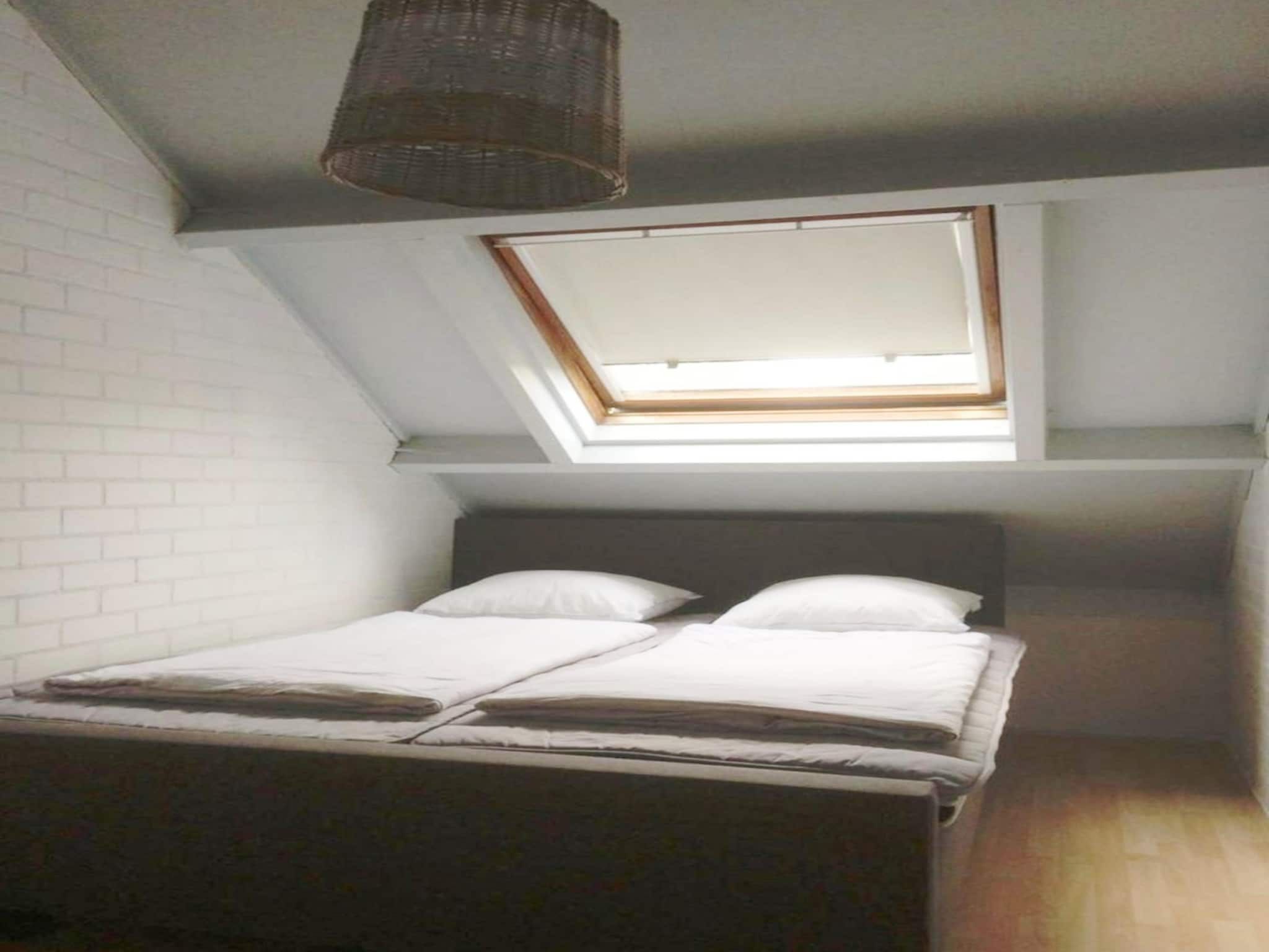 Een slaapkamer van Schoneveld 163 Duinroos Breskens in Breskens