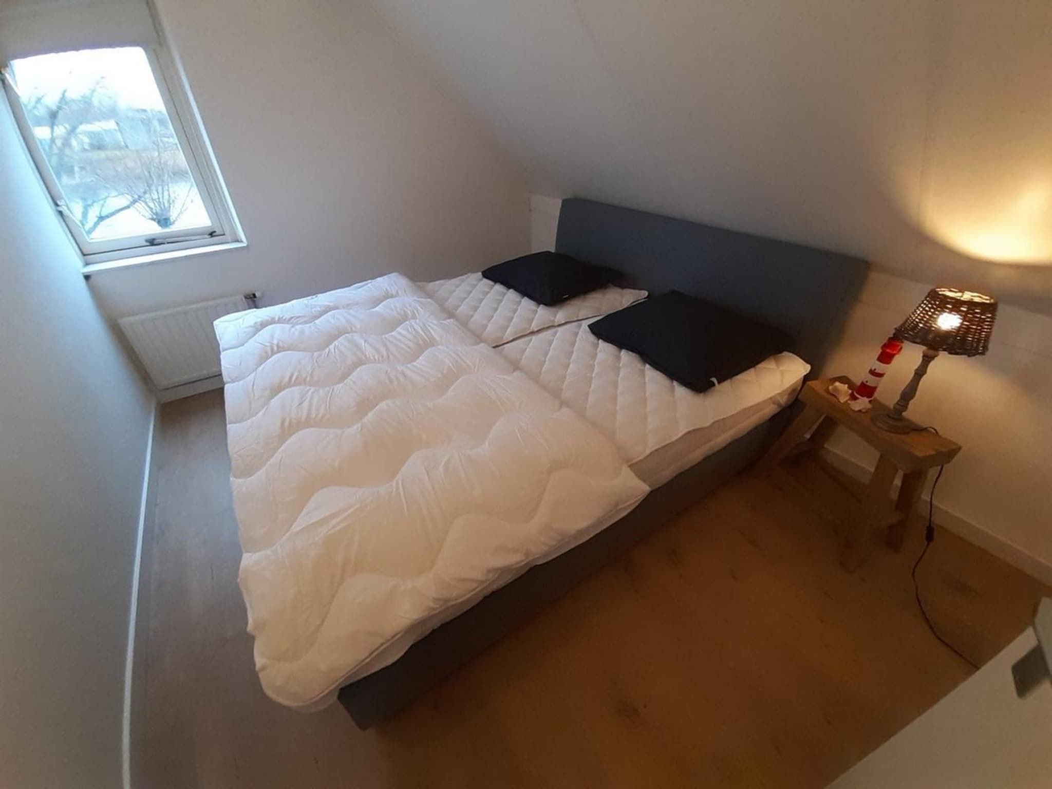 Een slaapkamer van Scheldeveste 33 Zwin Breskens in Breskens