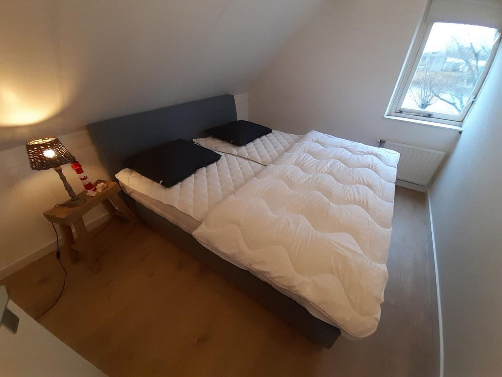 Een slaapkamer van Scheldeveste 33 Zwin Breskens in Breskens