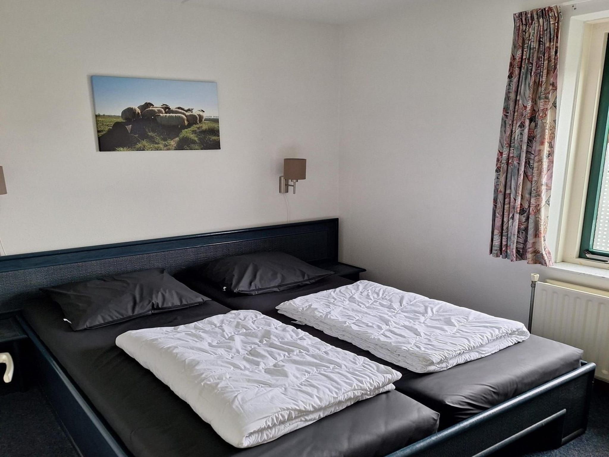 Een slaapkamer van Schoneveld 170 Zeemeeuw Breskens in Breskens