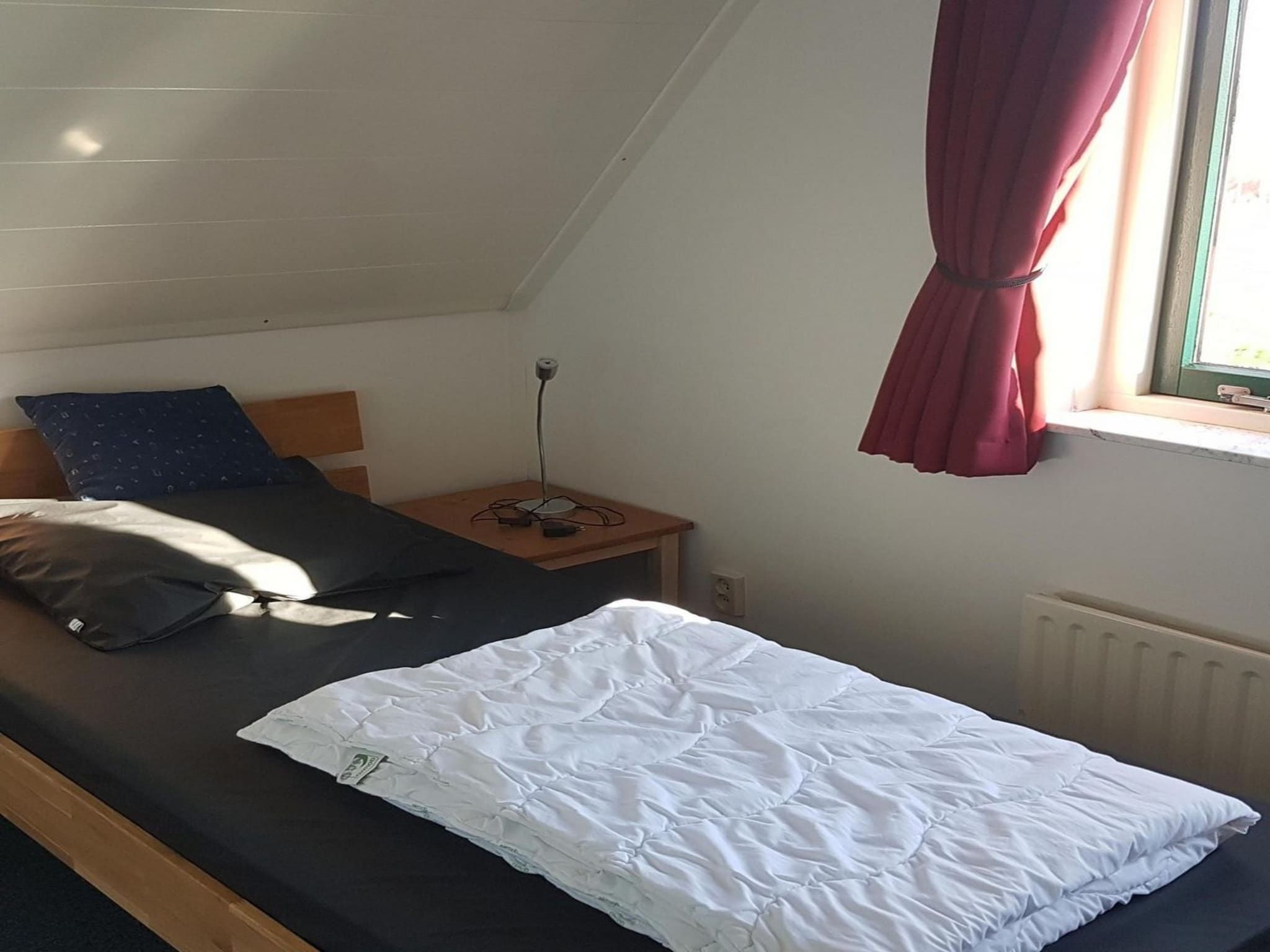 Een slaapkamer van Schoneveld 170 Zeemeeuw Breskens in Breskens