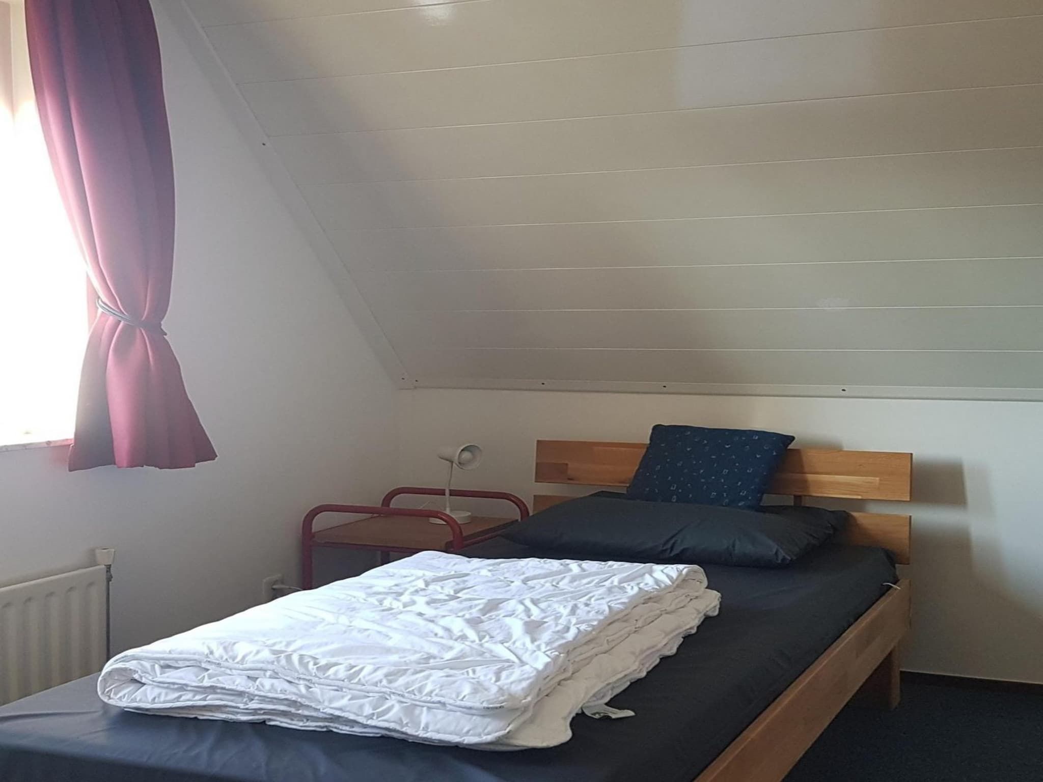 Een slaapkamer van Schoneveld 170 Zeemeeuw Breskens in Breskens