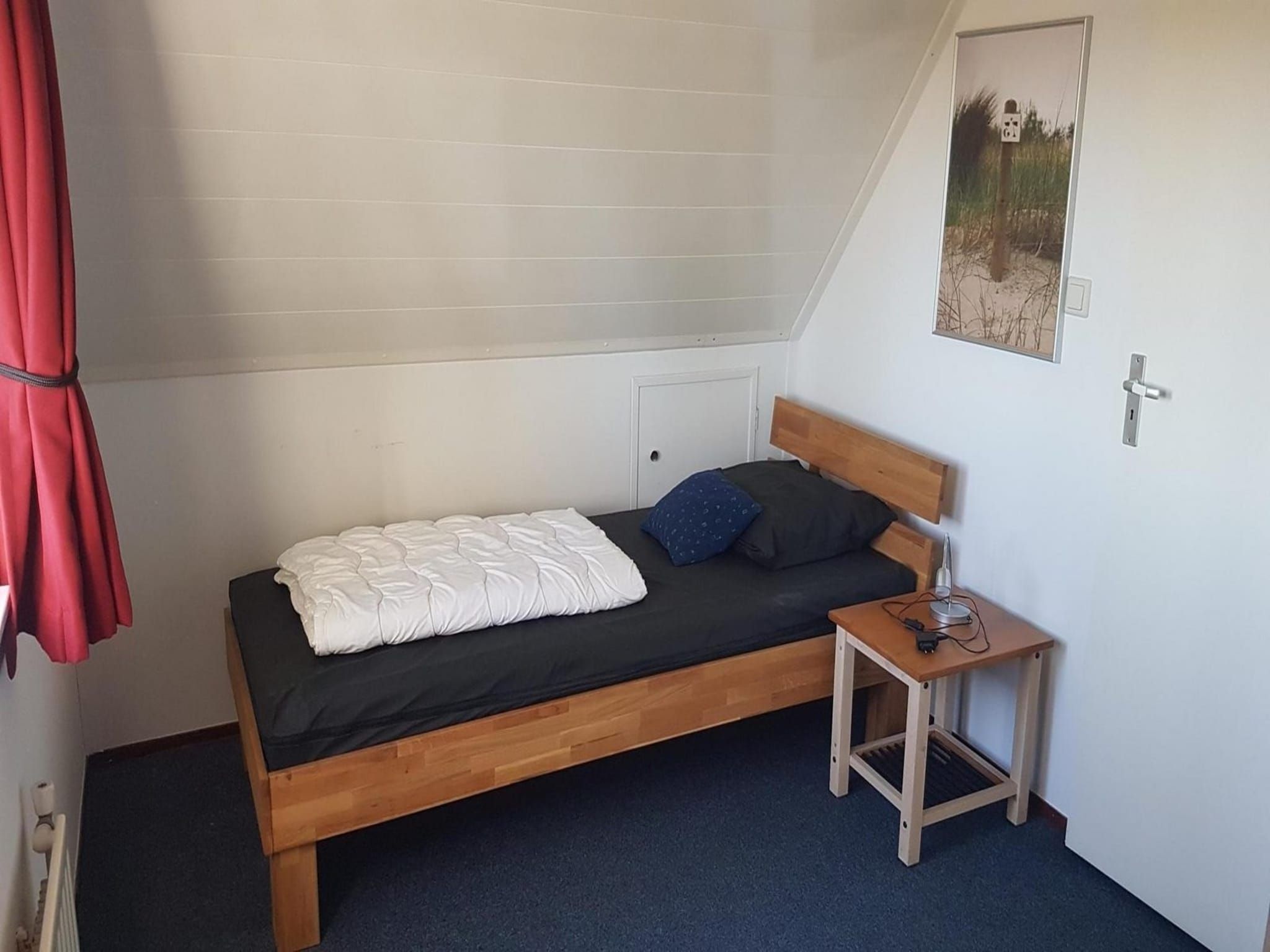 Een slaapkamer van Schoneveld 170 Zeemeeuw Breskens in Breskens