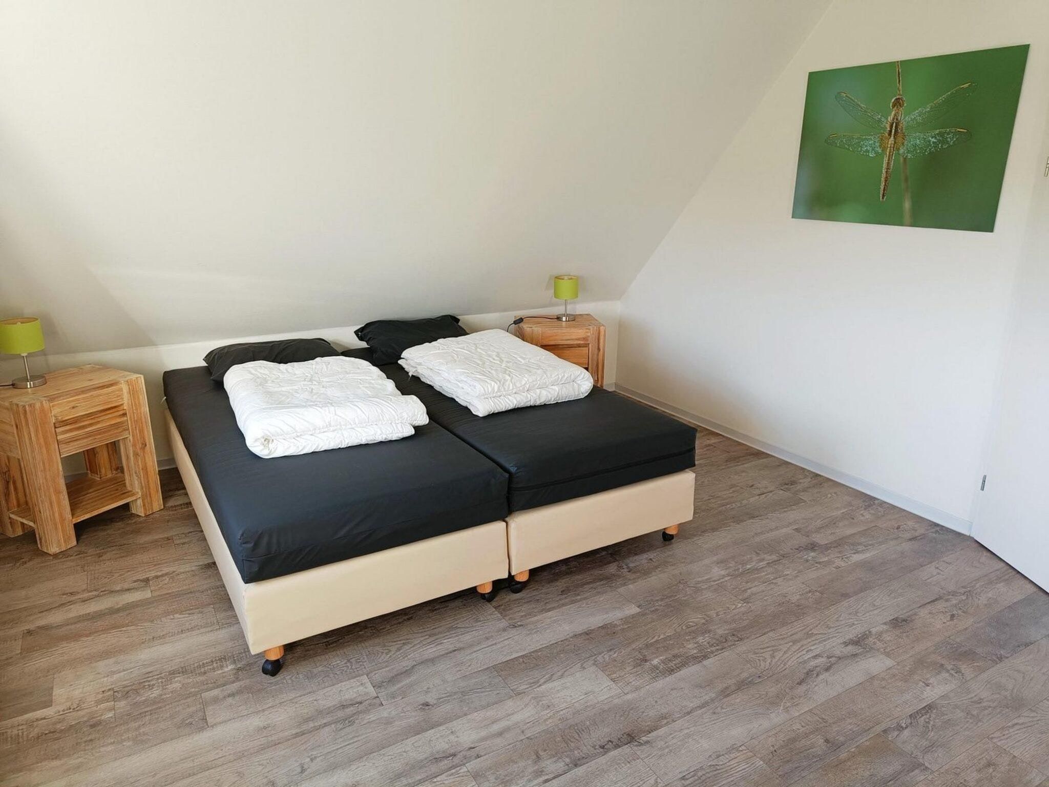 Een slaapkamer van Landgoed de Lente 12 Krokus Breskens in Breskens