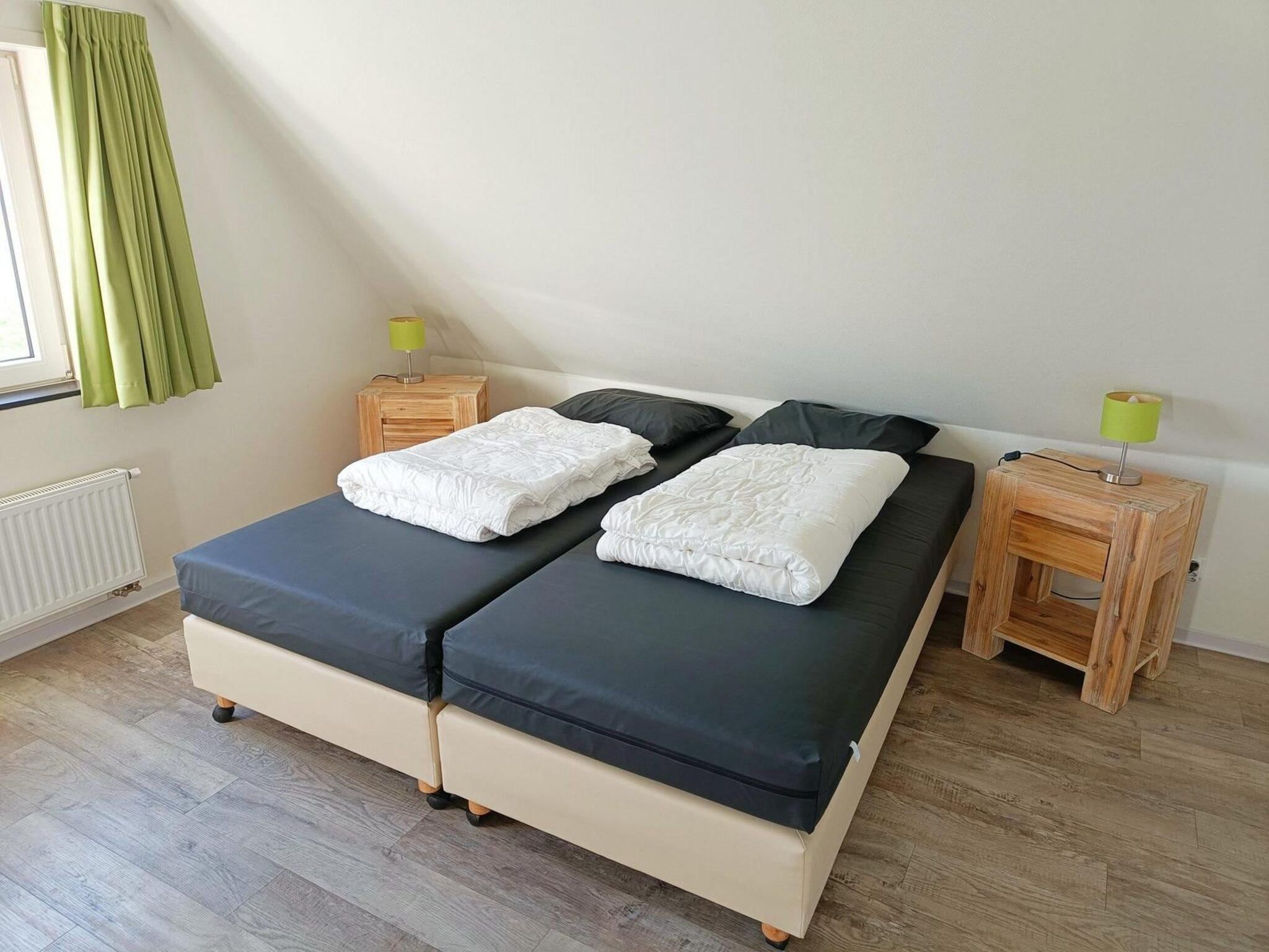 Een slaapkamer van Landgoed de Lente 12 Krokus Breskens in Breskens