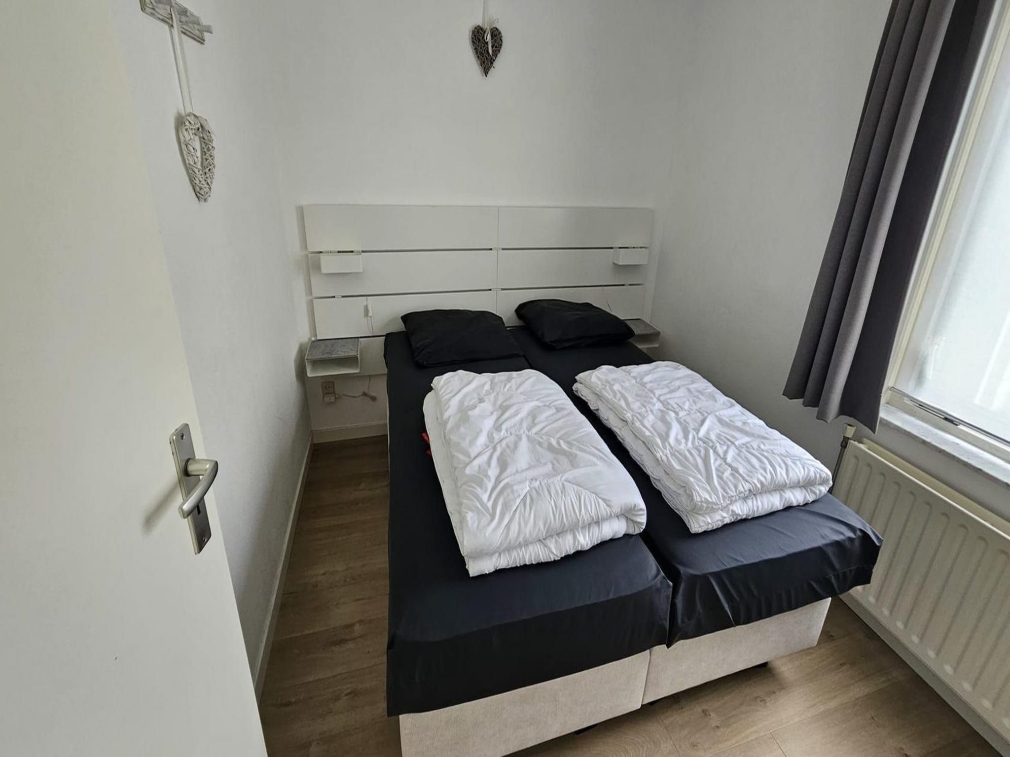 Een slaapkamer van Schoneveld 176 Zeemeeuw Breskens in Breskens