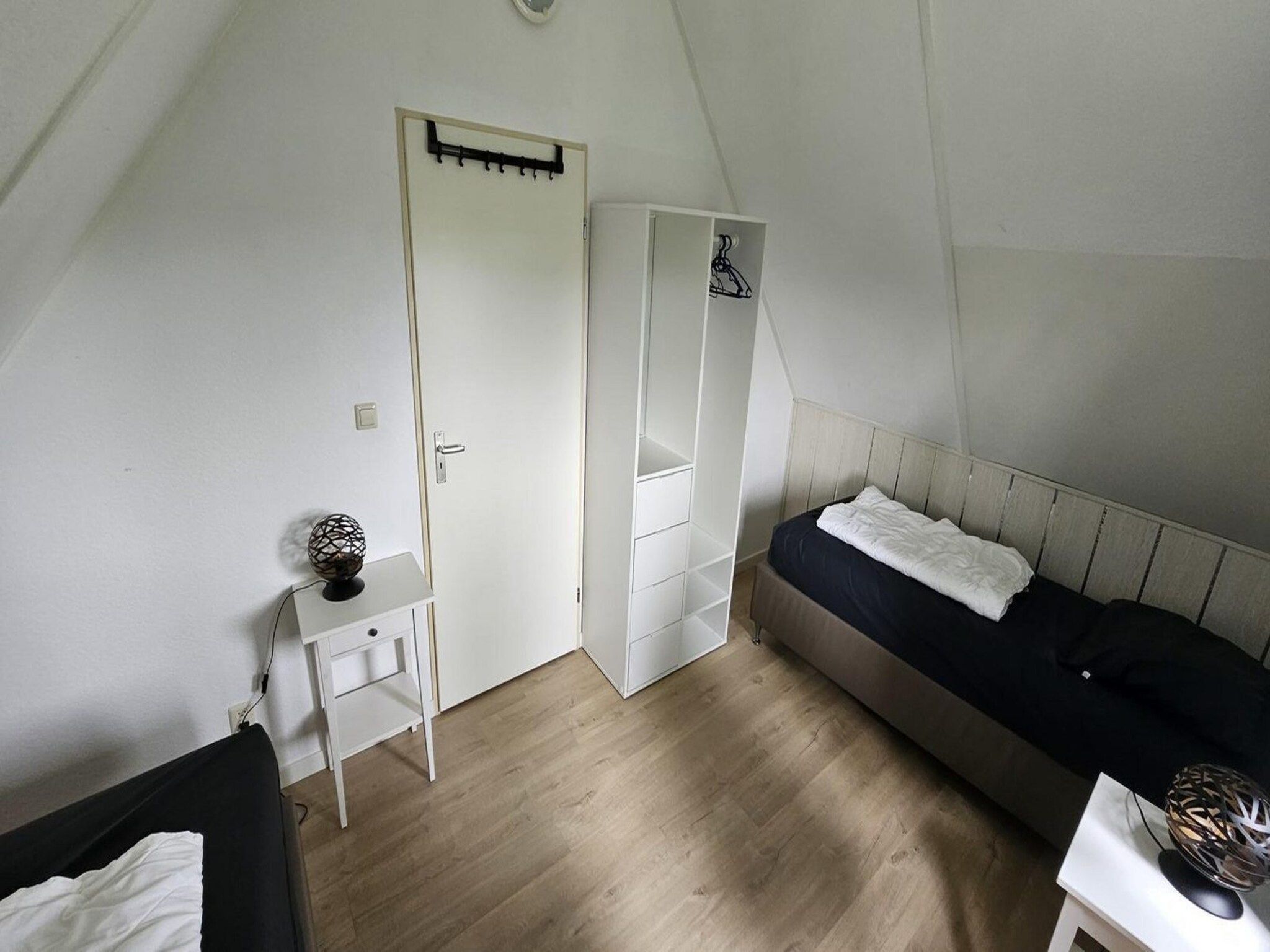 Een slaapkamer van Schoneveld 176 Zeemeeuw Breskens in Breskens