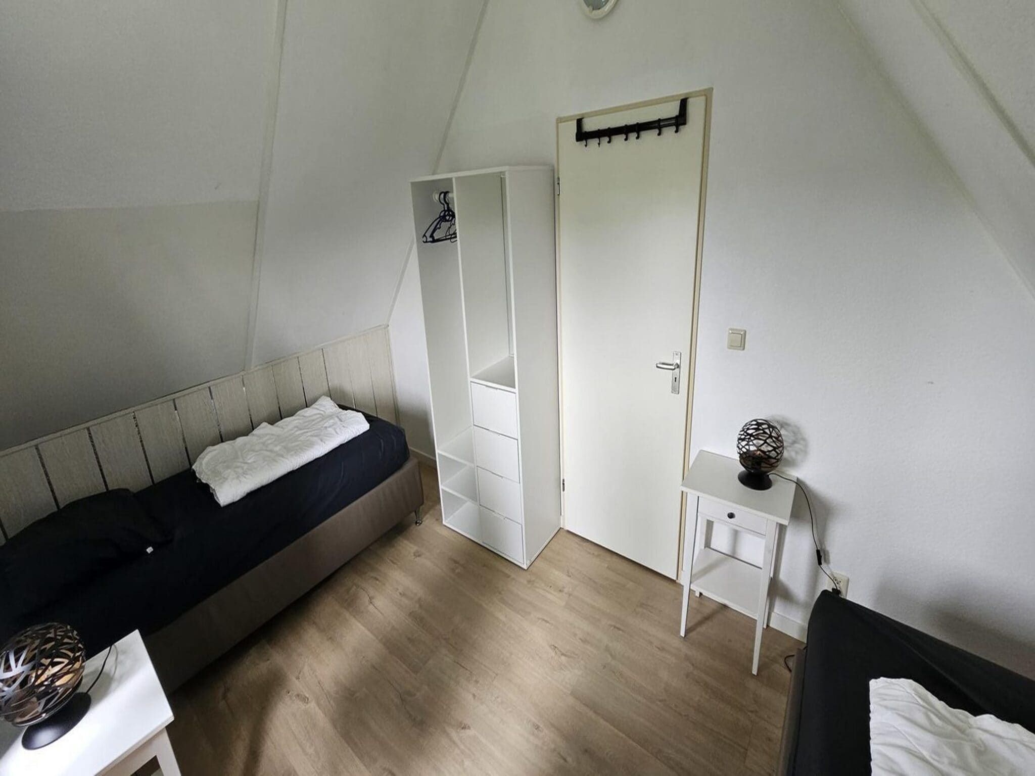 Een slaapkamer van Schoneveld 176 Zeemeeuw Breskens in Breskens