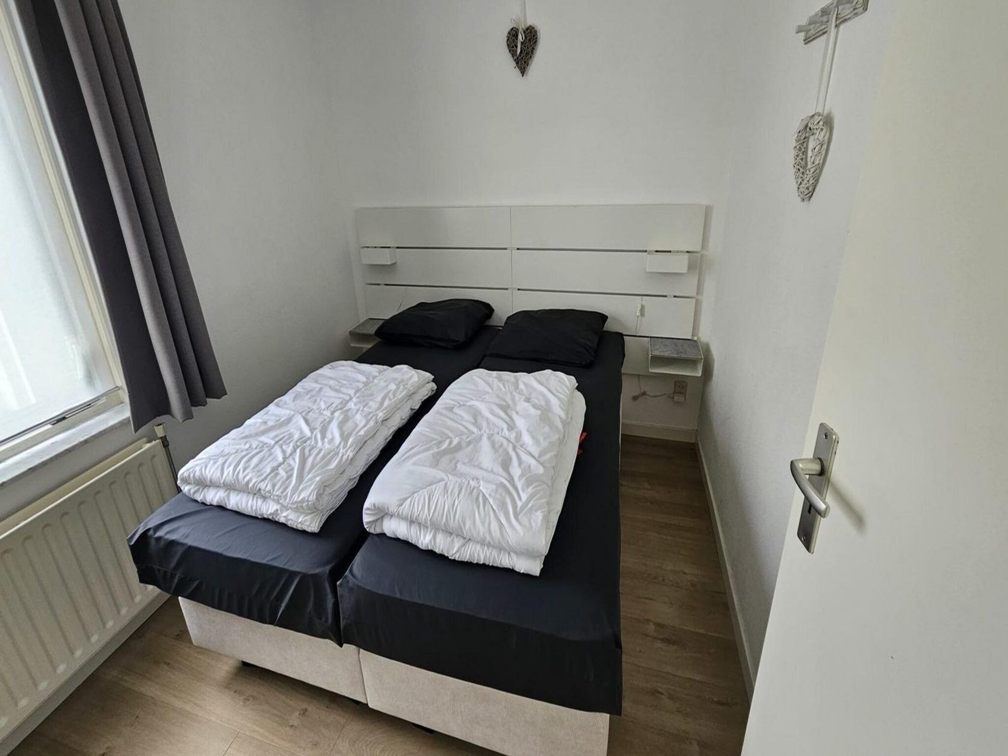 Een slaapkamer van Schoneveld 176 Zeemeeuw Breskens in Breskens