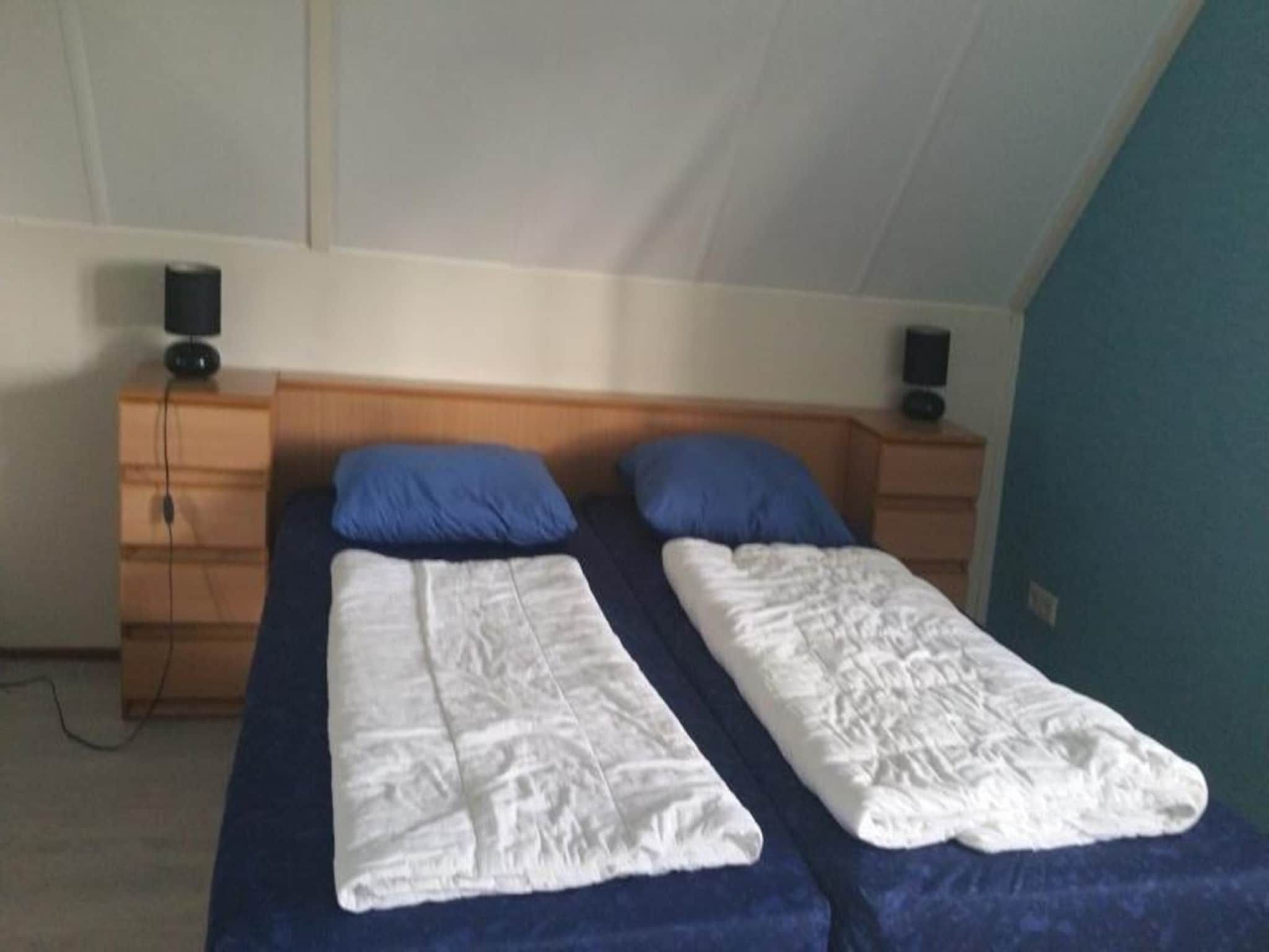 Een slaapkamer van Schoneveld 182 Stern Breskens in Breskens