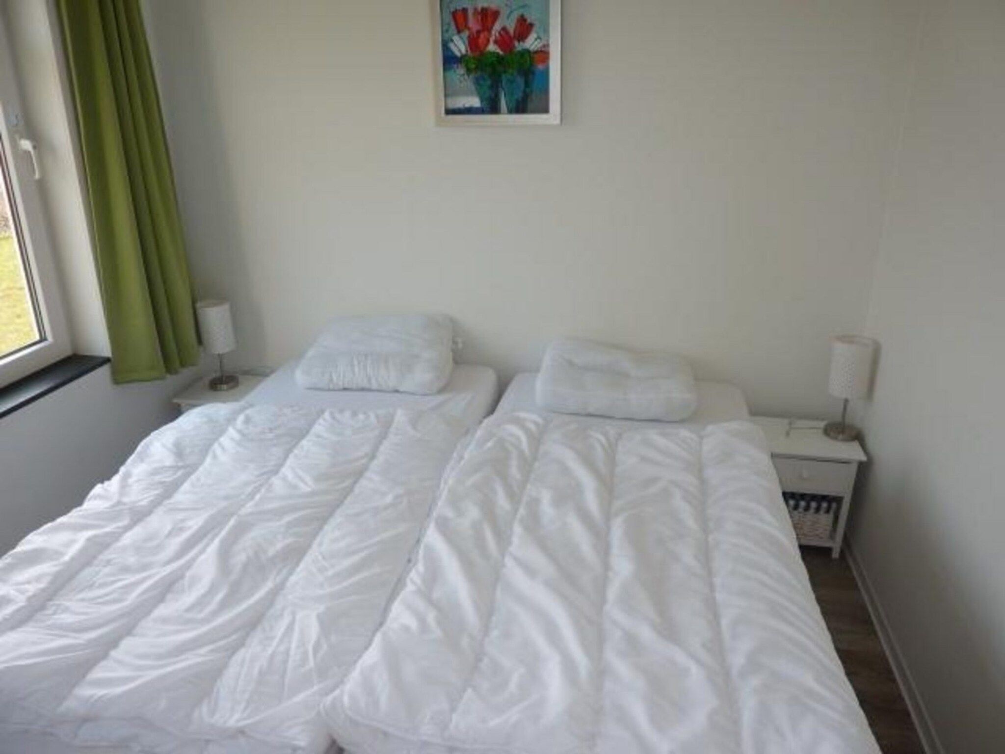 Een slaapkamer van Landgoed de Lente 28 Tulp Breskens in Breskens