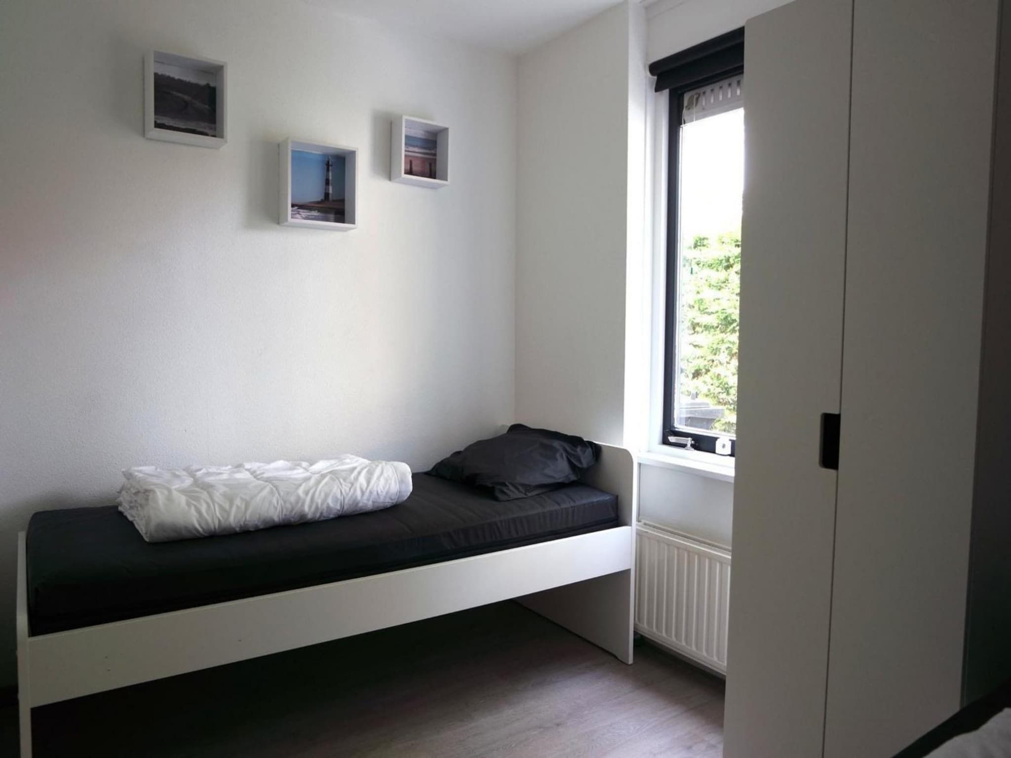 Een slaapkamer van Schoneveld 184 Stern Breskens in Breskens