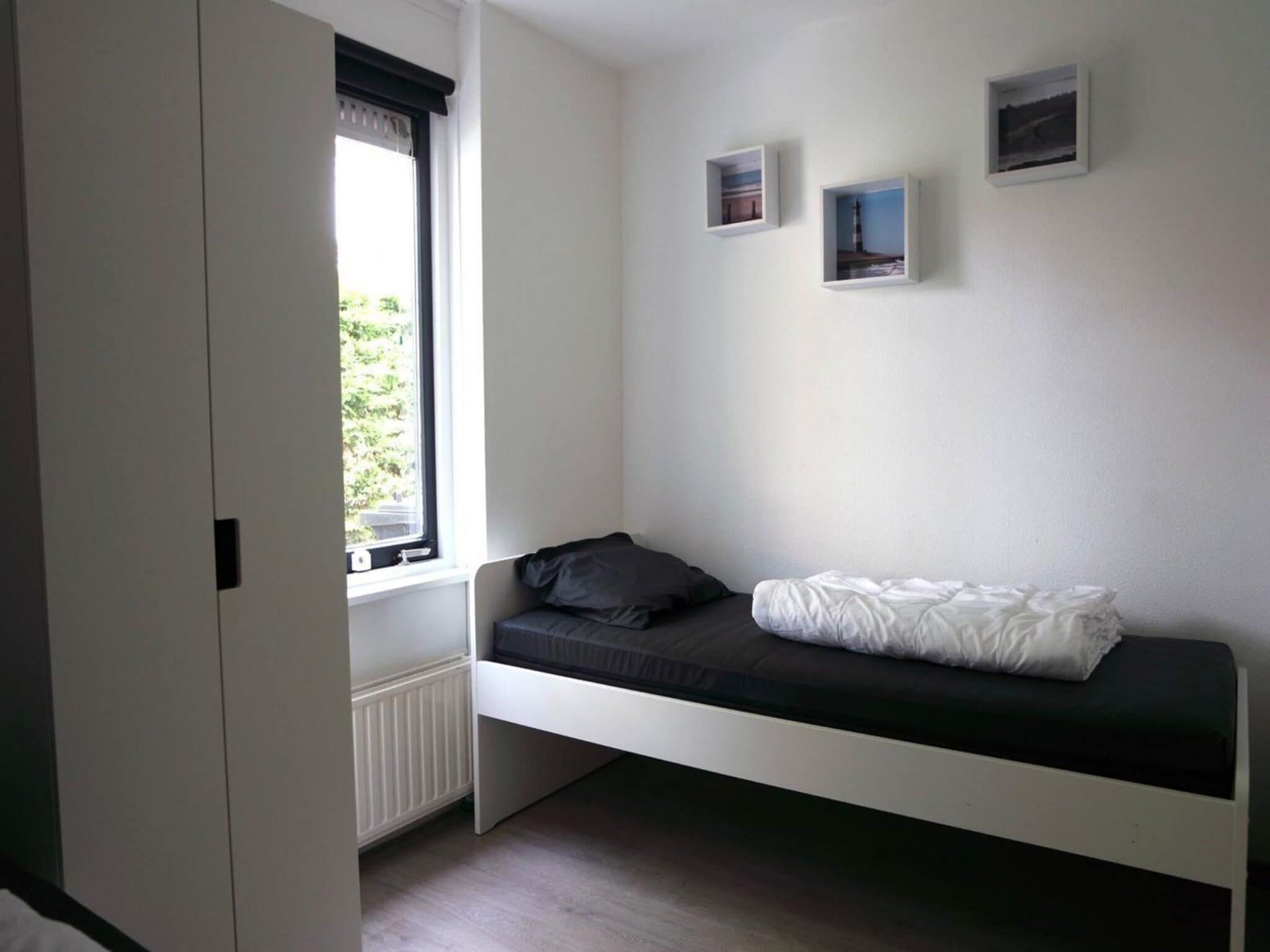 Een slaapkamer van Schoneveld 184 Stern Breskens in Breskens