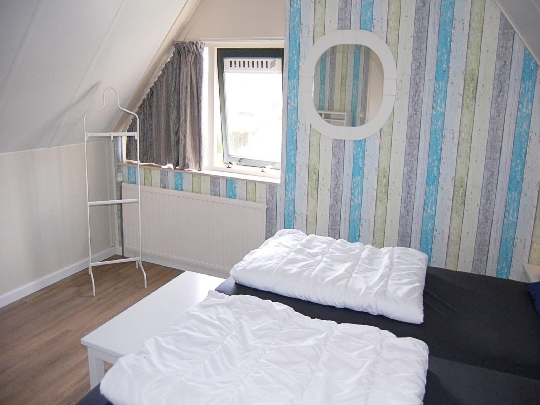 Een slaapkamer van Schoneveld 232 Stern Breskens in Breskens