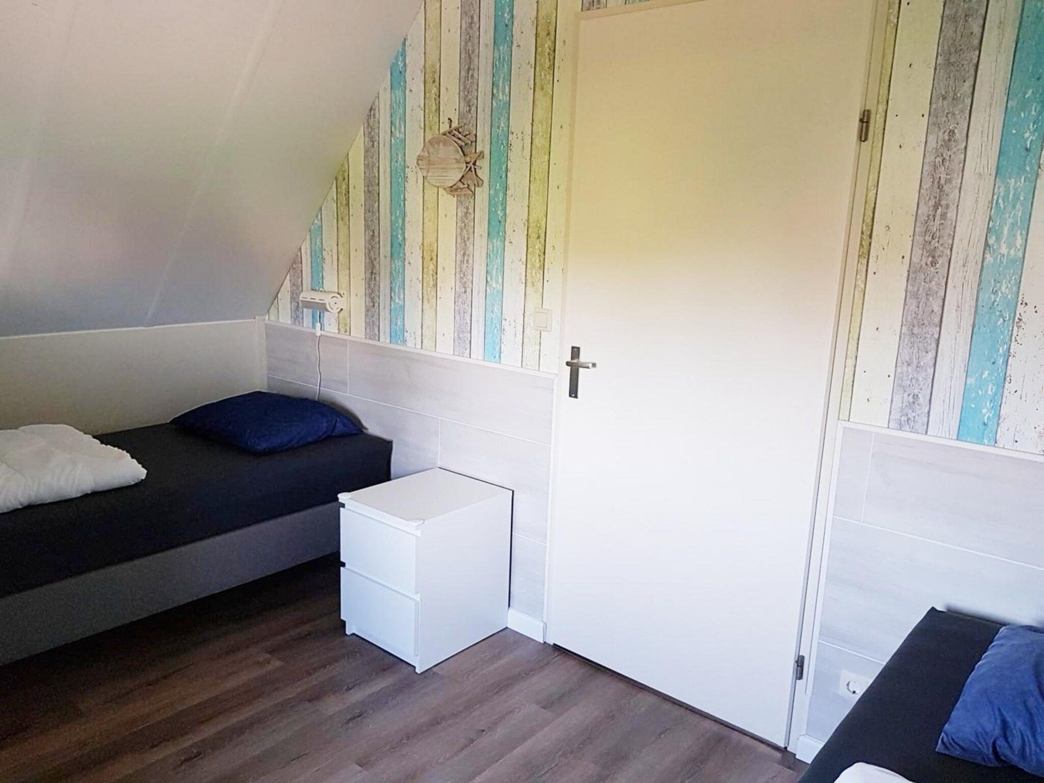 Een slaapkamer van Schoneveld 232 Stern Breskens in Breskens