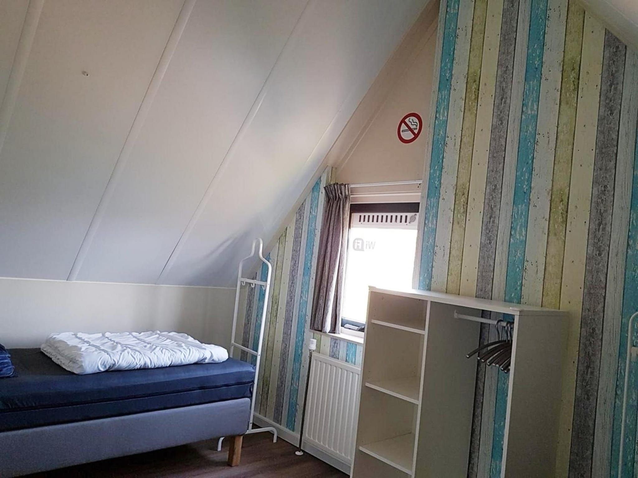 Een slaapkamer van Schoneveld 232 Stern Breskens in Breskens