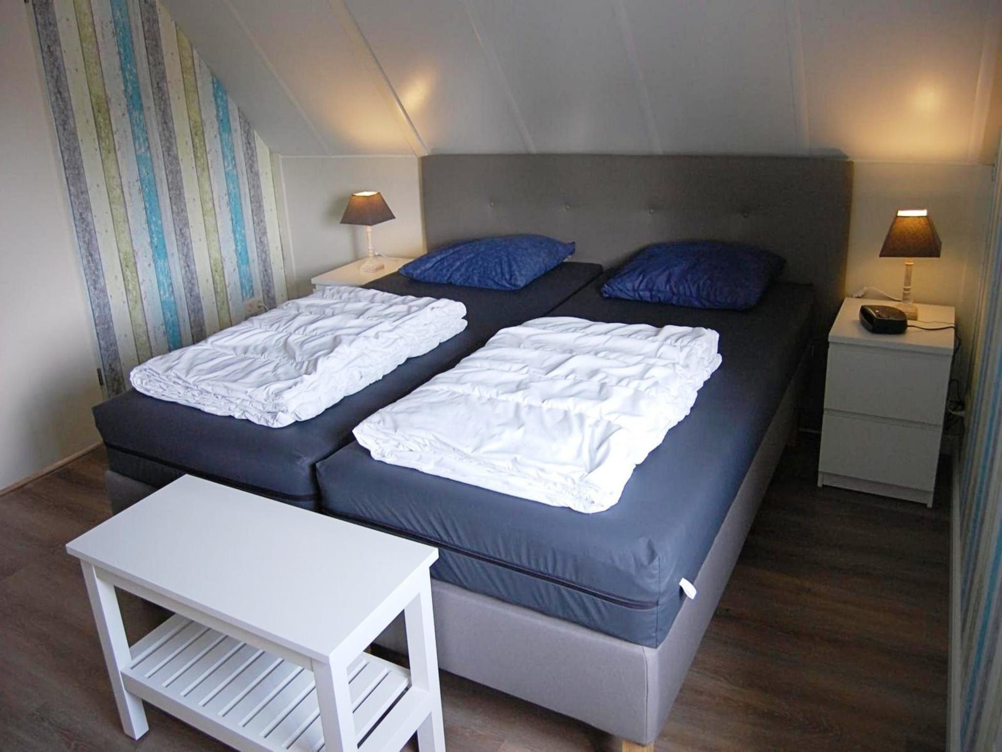 Een slaapkamer van Schoneveld 232 Stern Breskens in Breskens