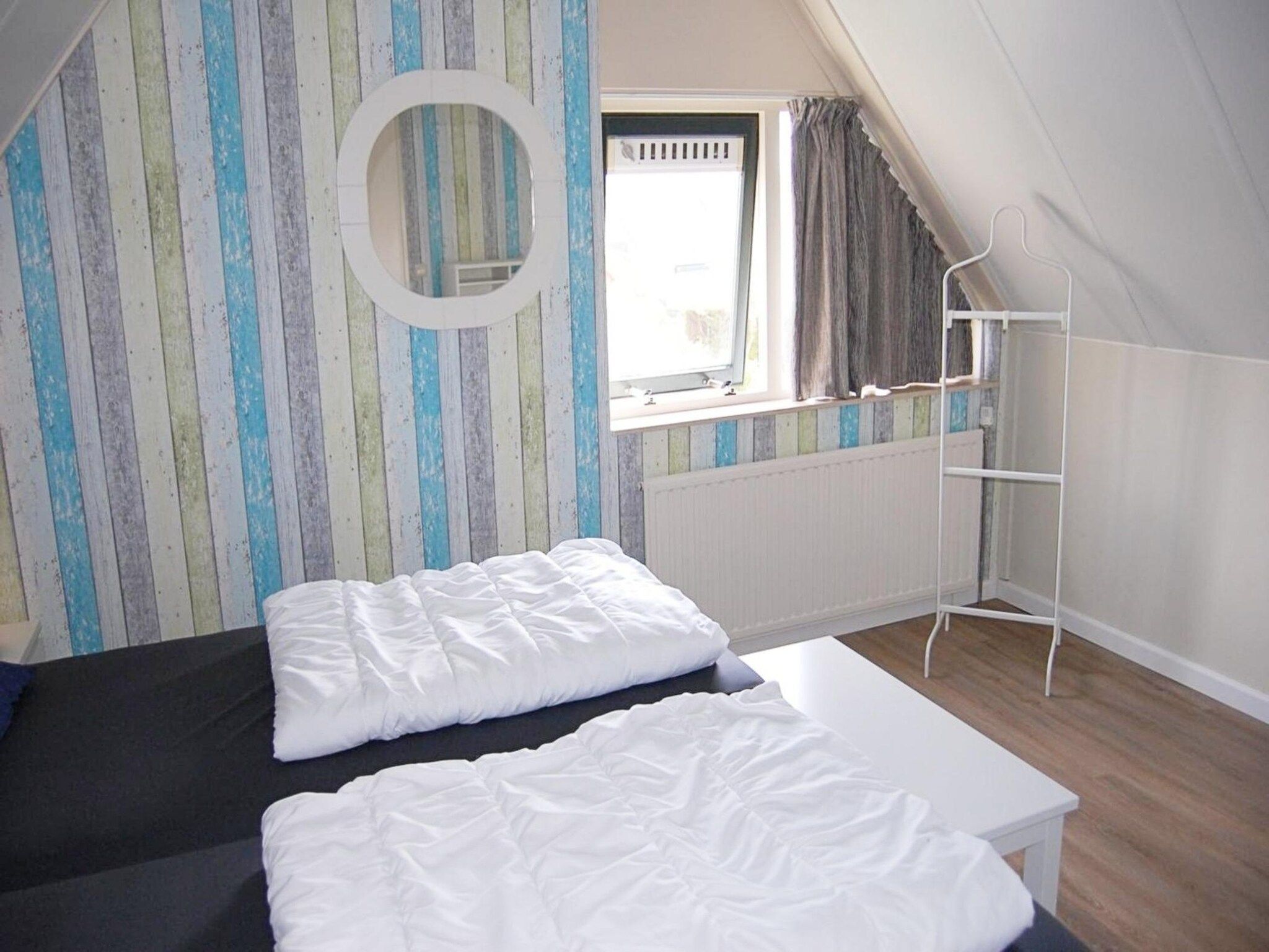 Een slaapkamer van Schoneveld 232 Stern Breskens in Breskens