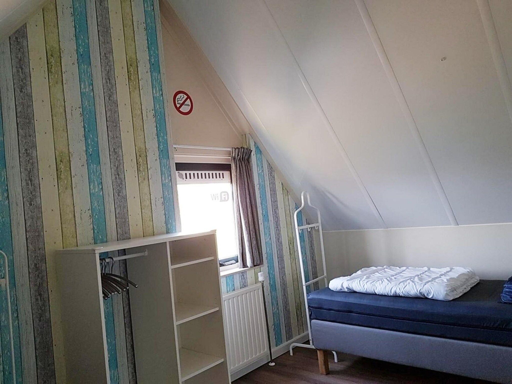 Een slaapkamer van Schoneveld 232 Stern Breskens in Breskens