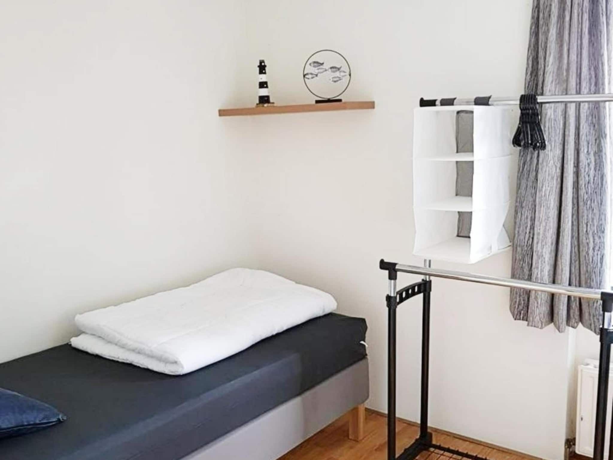 Een slaapkamer van Schoneveld 232 Stern Breskens in Breskens