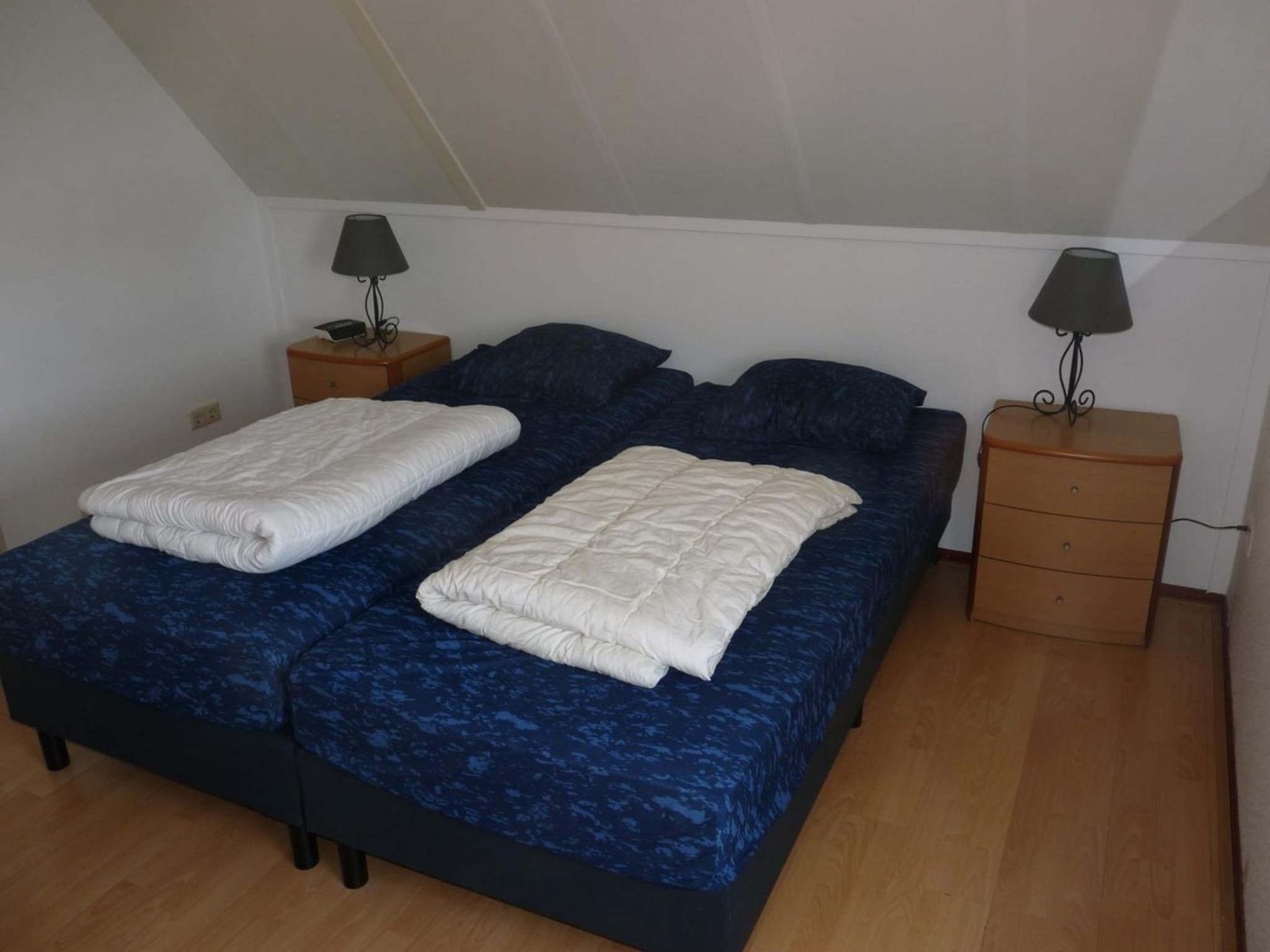 Een slaapkamer van Schoneveld 246 Stern Breskens in Breskens