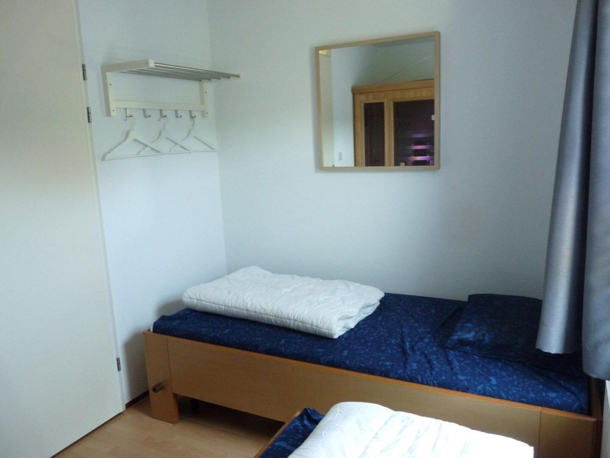 Een slaapkamer van Schoneveld 246 Stern Breskens in Breskens