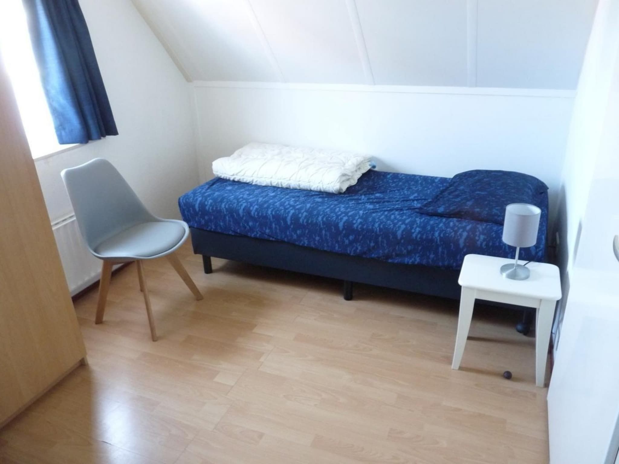 Een slaapkamer van Schoneveld 246 Stern Breskens in Breskens