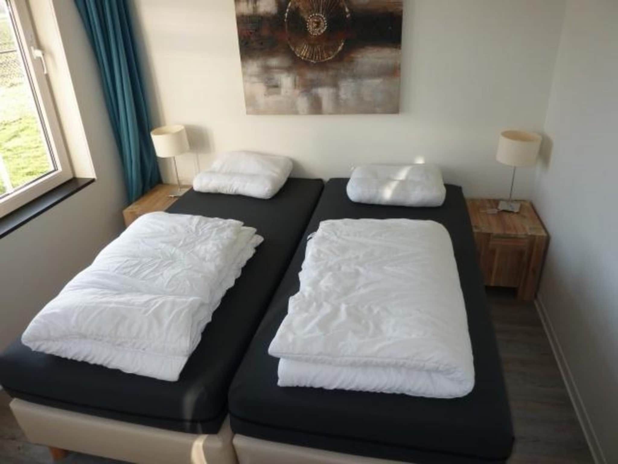 Een slaapkamer van Landgoed de Lente 32 Sneeuwklokje Breskens in Breskens