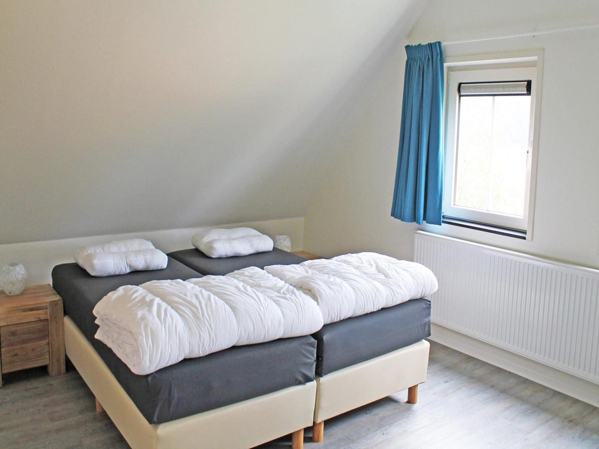 Een slaapkamer van Landgoed de Lente 32 Sneeuwklokje Breskens in Breskens