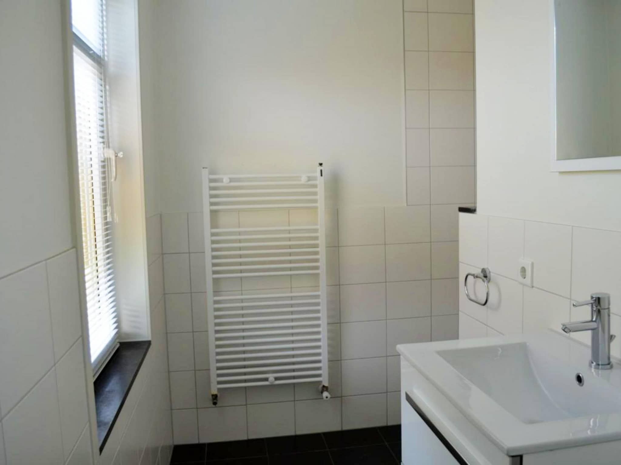 De badkamer van Landgoed de Lente 34 Krokus Breskens in Breskens