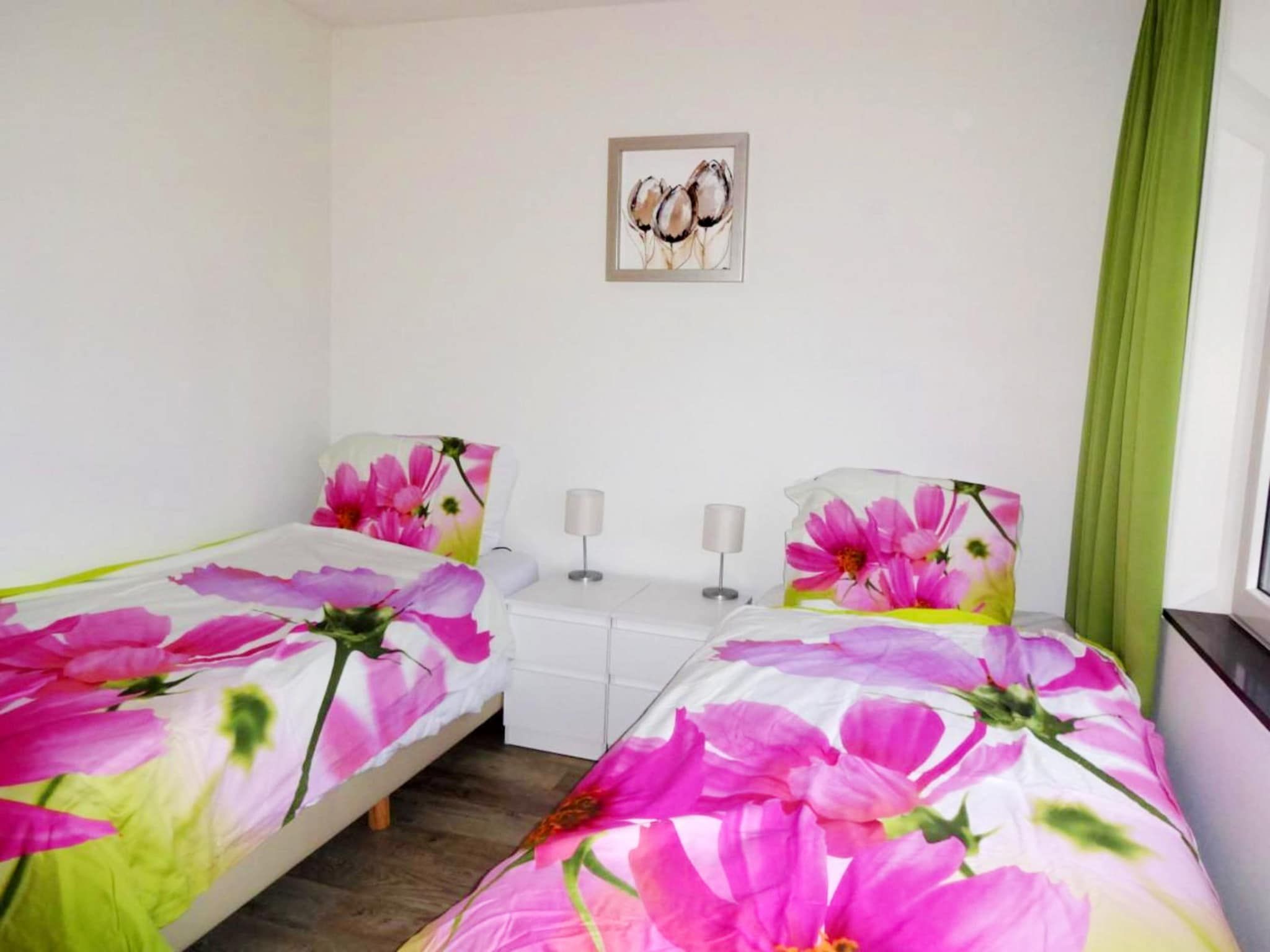 Een slaapkamer van Landgoed de Lente 34 Krokus Breskens in Breskens