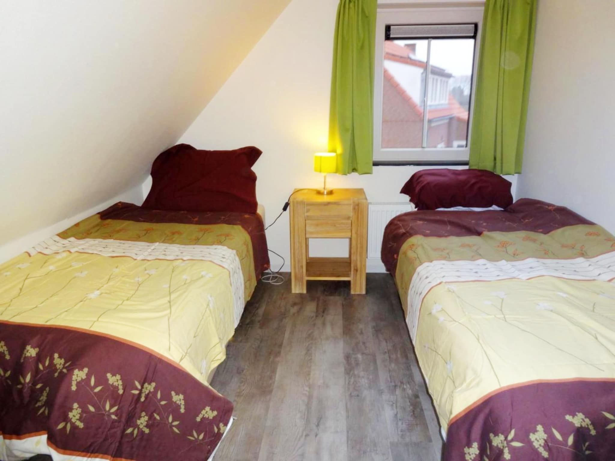 Een slaapkamer van Landgoed de Lente 34 Krokus Breskens in Breskens