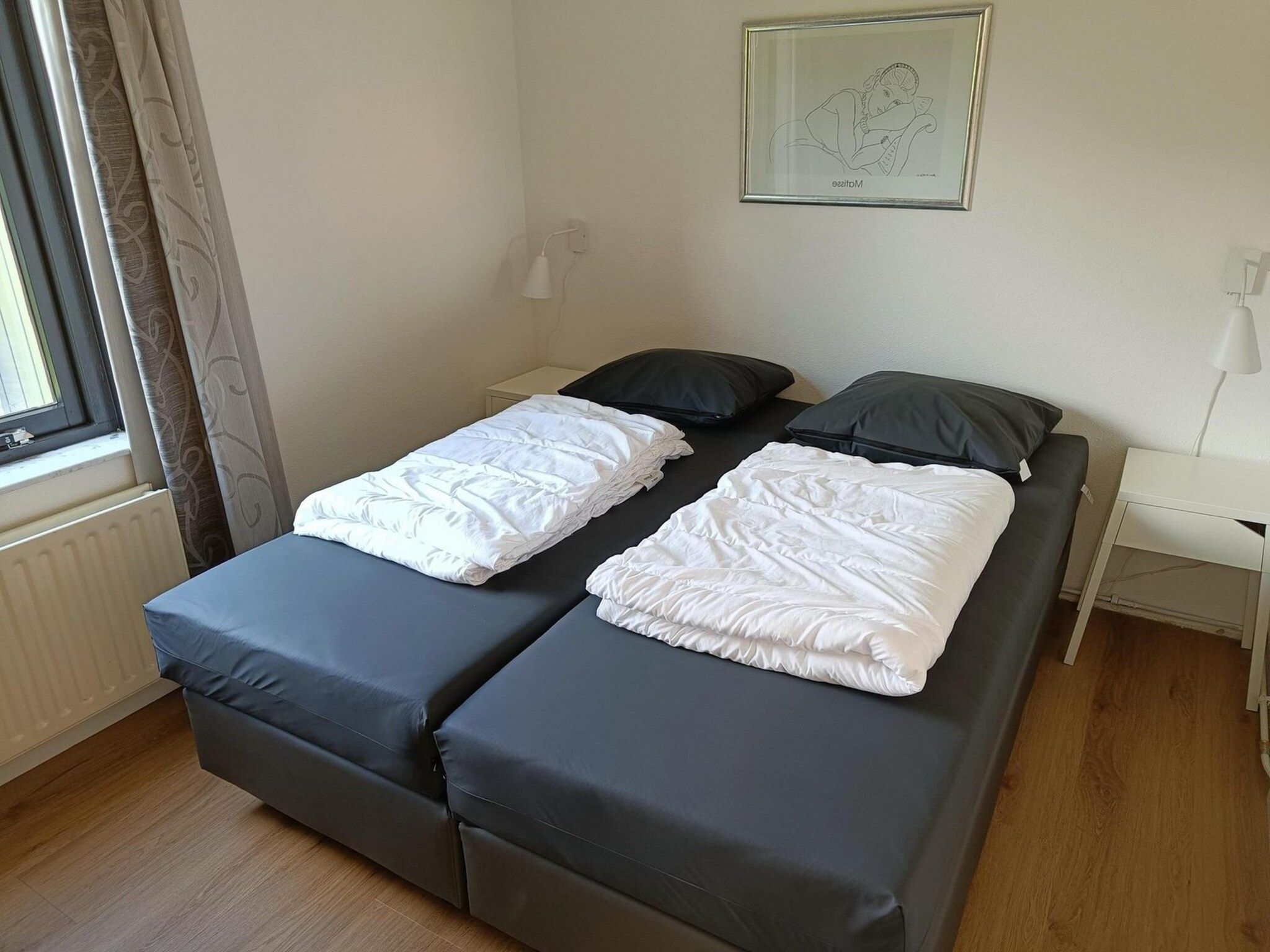 Een slaapkamer van Schoneveld 124 Zeemeeuw Breskens in Breskens