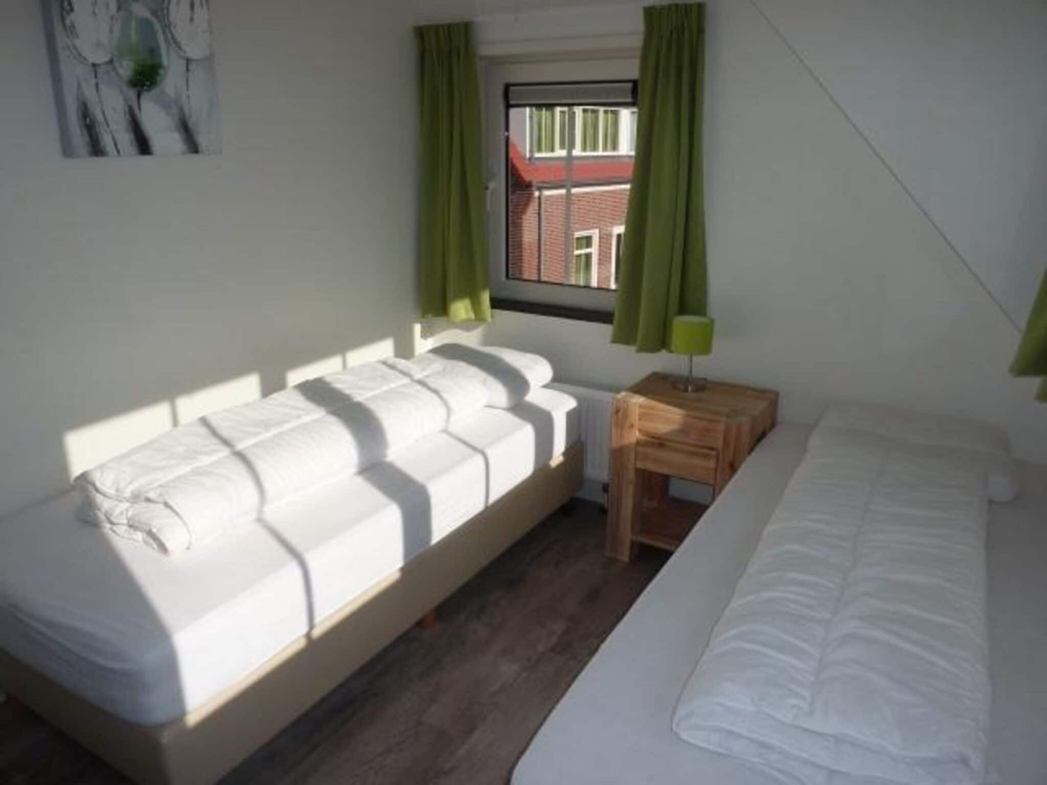 Een slaapkamer van Landgoed de Lente 36 Krokus Breskens in Breskens