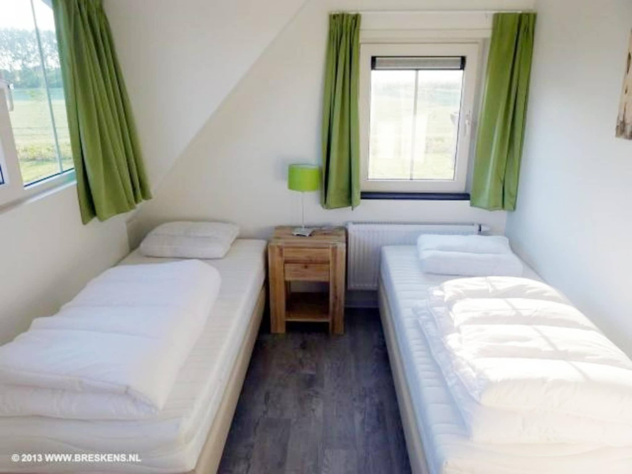 Een slaapkamer van Landgoed de Lente 40 Sneeuwklokje Breskens in Breskens