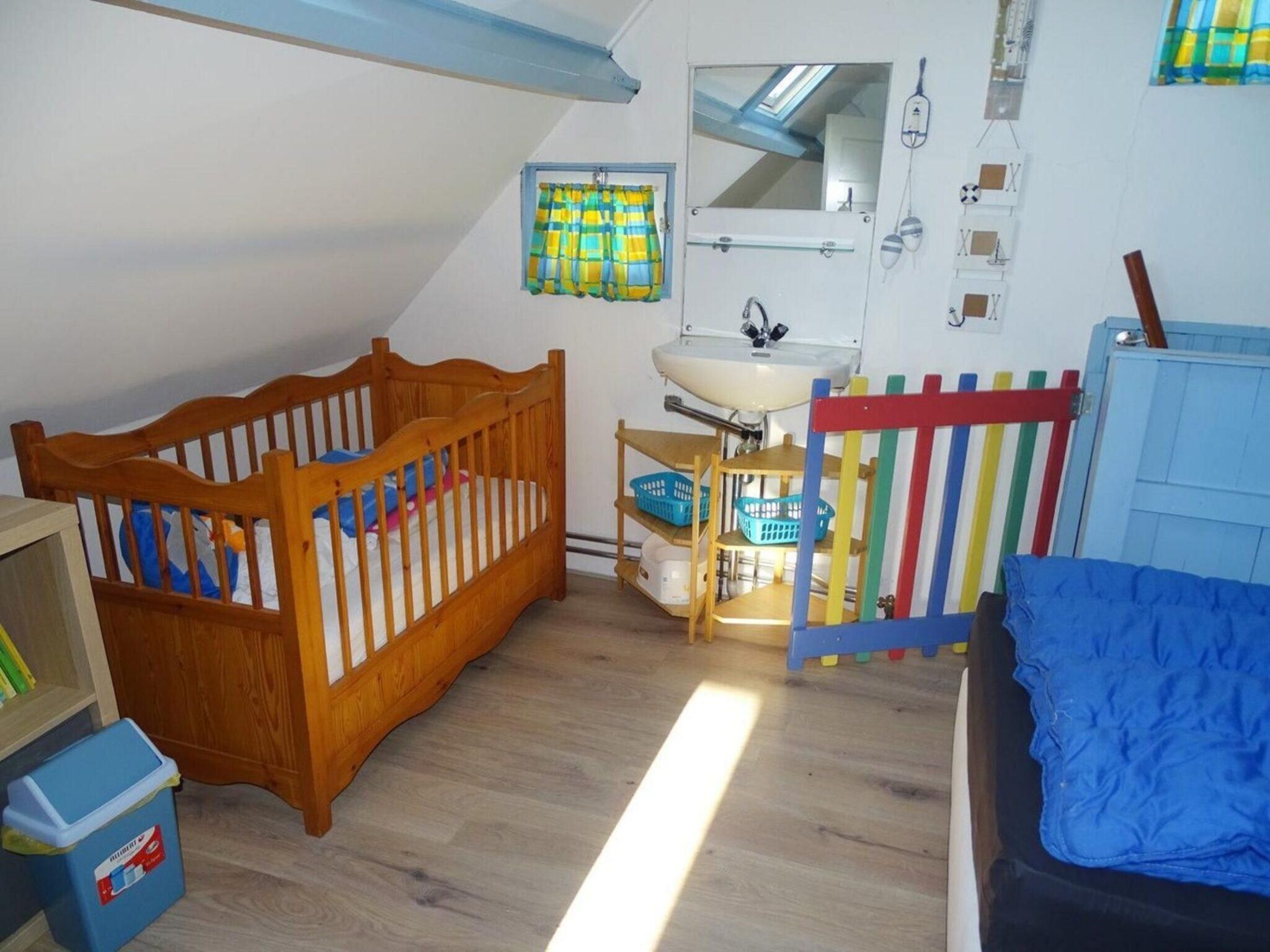 Een slaapkamer van Tragel 37 Schoondijke in Schoondijke