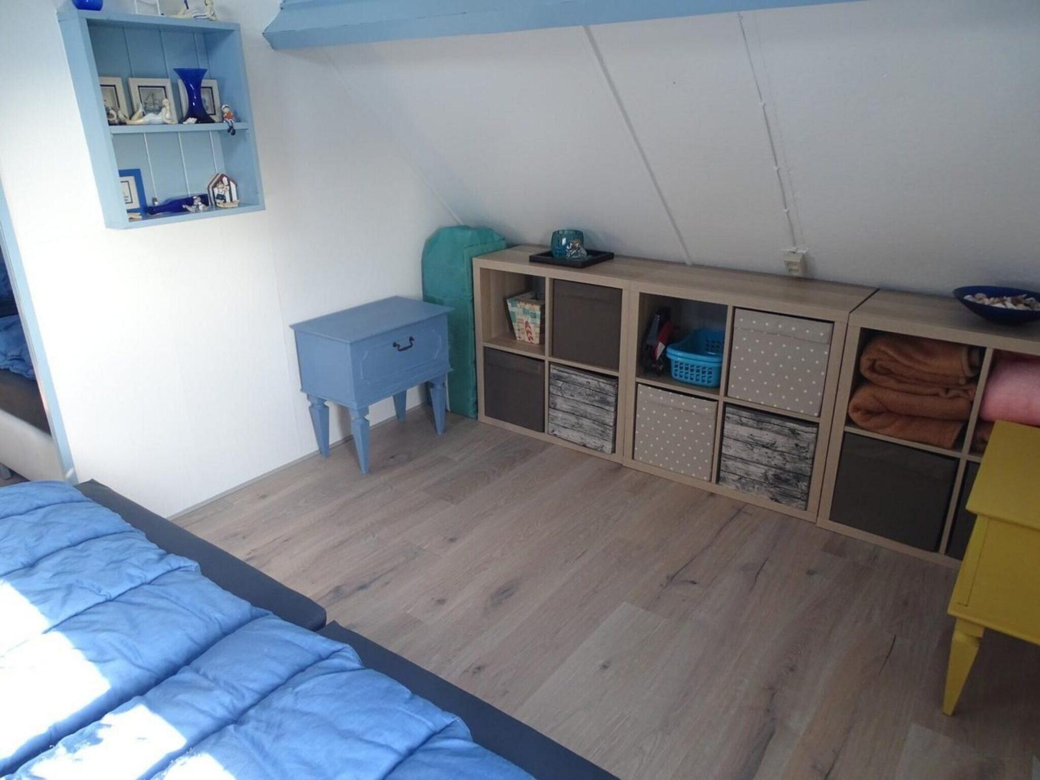 Een slaapkamer van Tragel 37 Schoondijke in Schoondijke